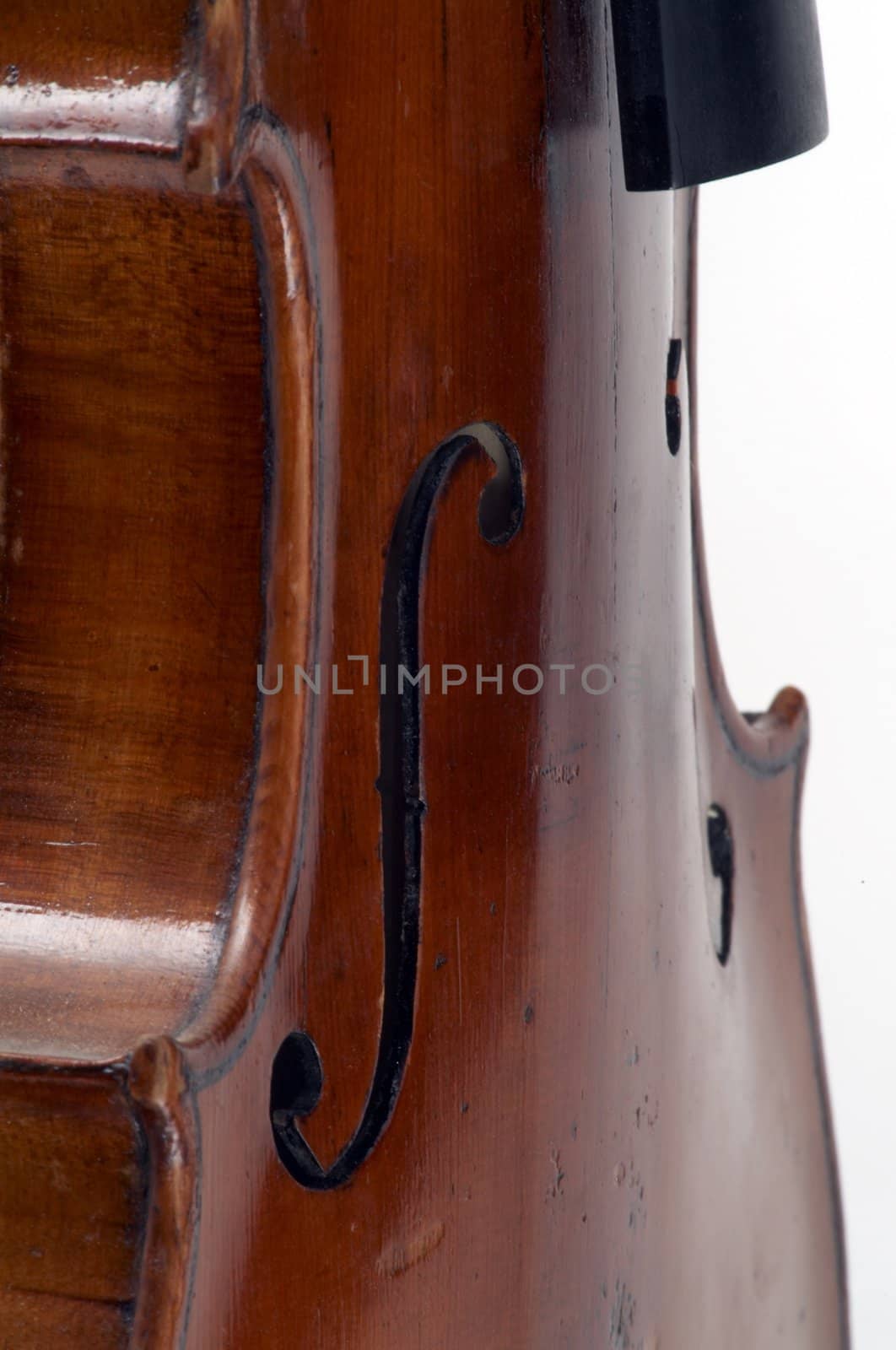 Part of an antique violin on white background