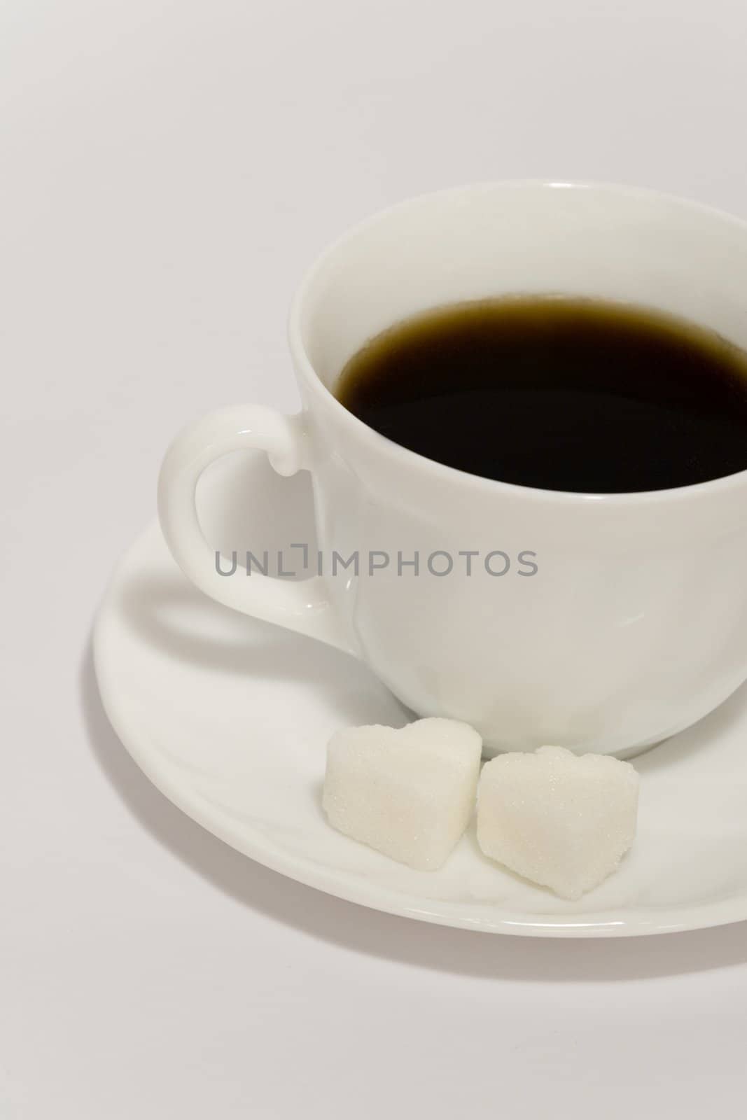 Cup of fresh coffee on white background