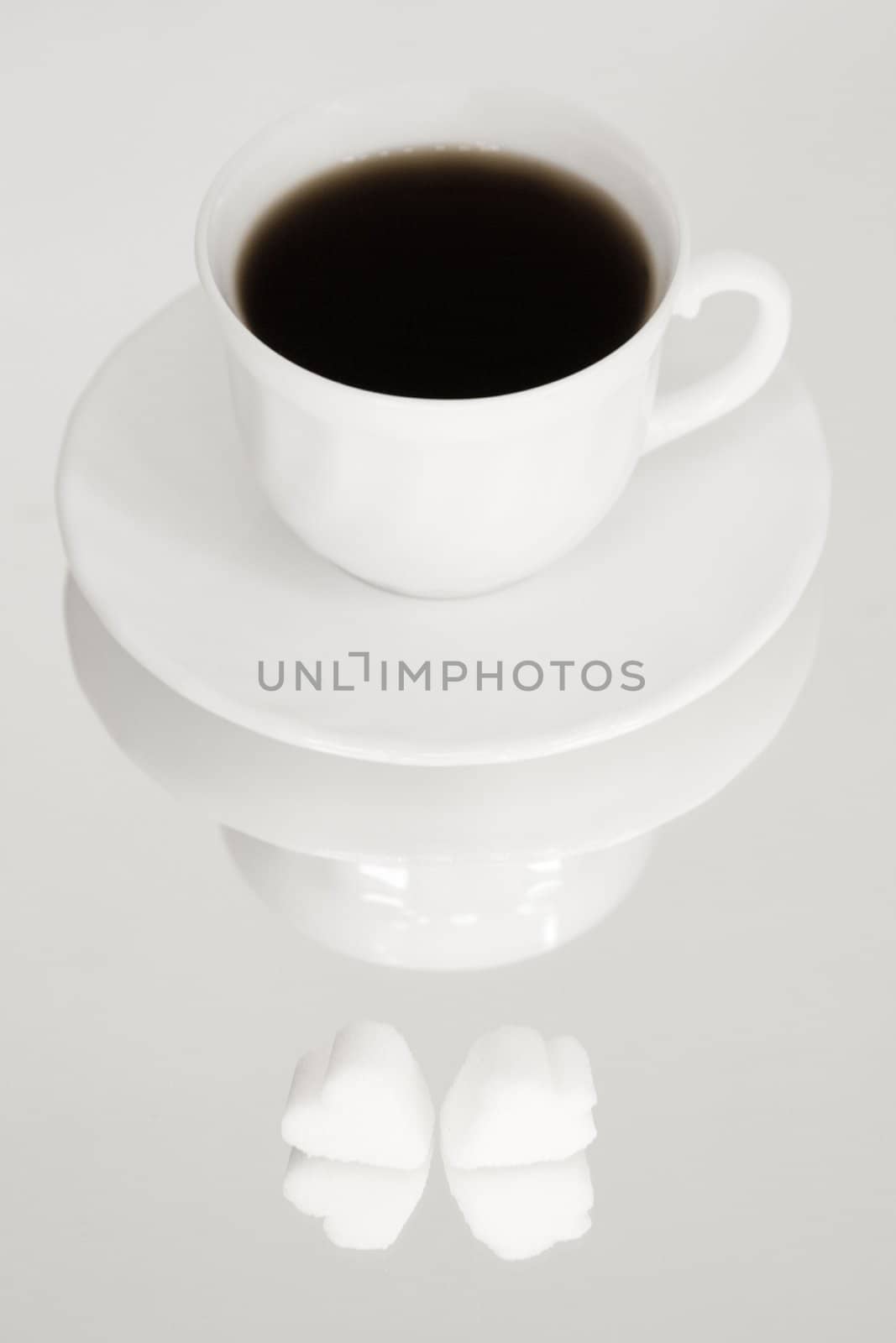 Cup of fresh coffee on white background