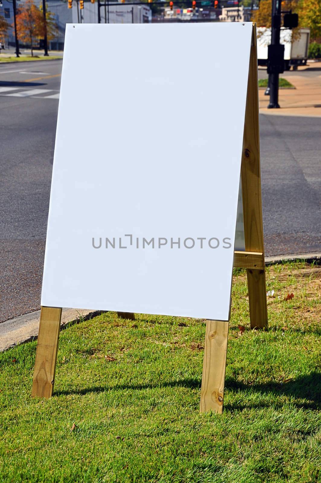 Blank Sign on Downtown City Street by dehooks