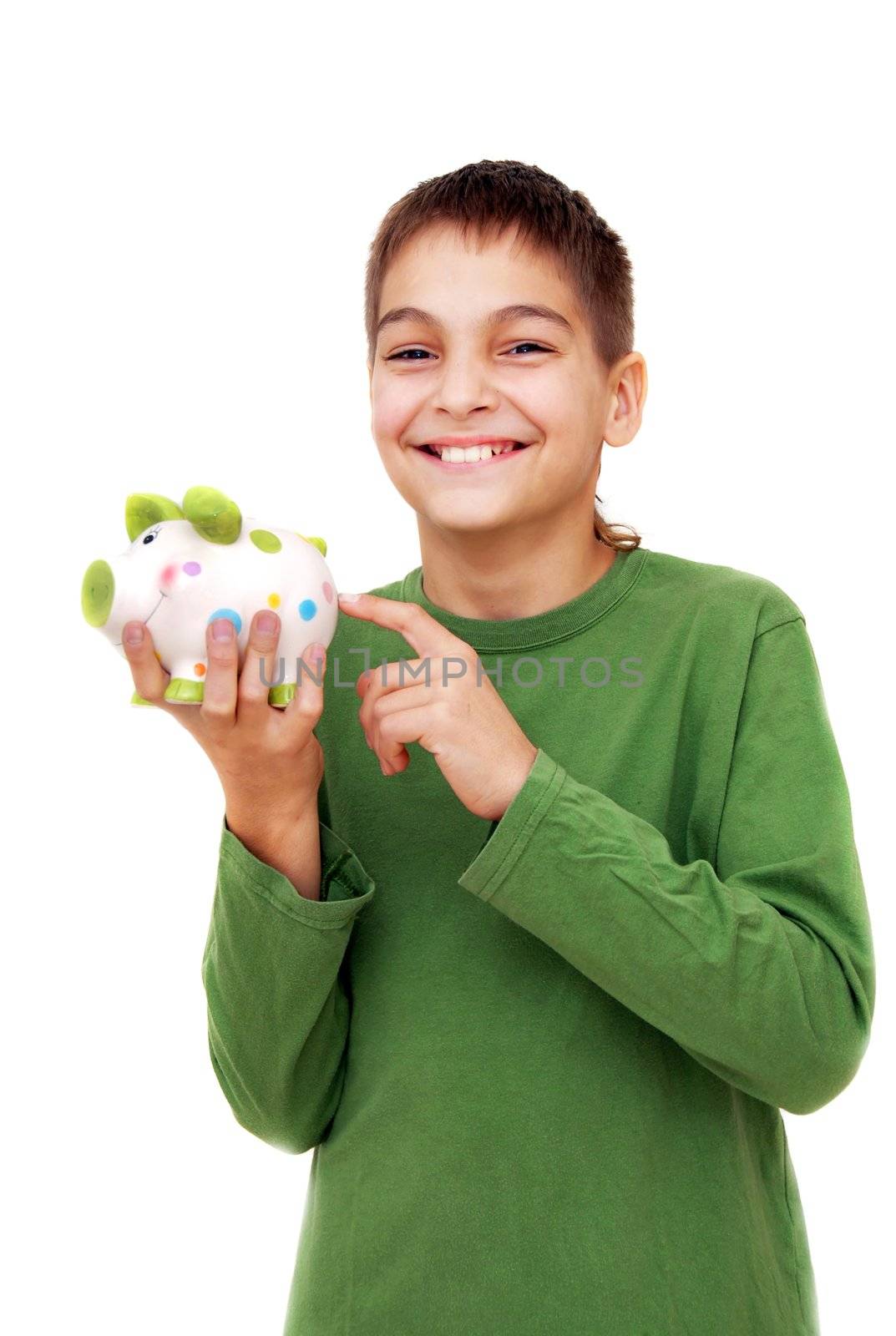 teenage boy smiling portrait points piggy money box isolated on white