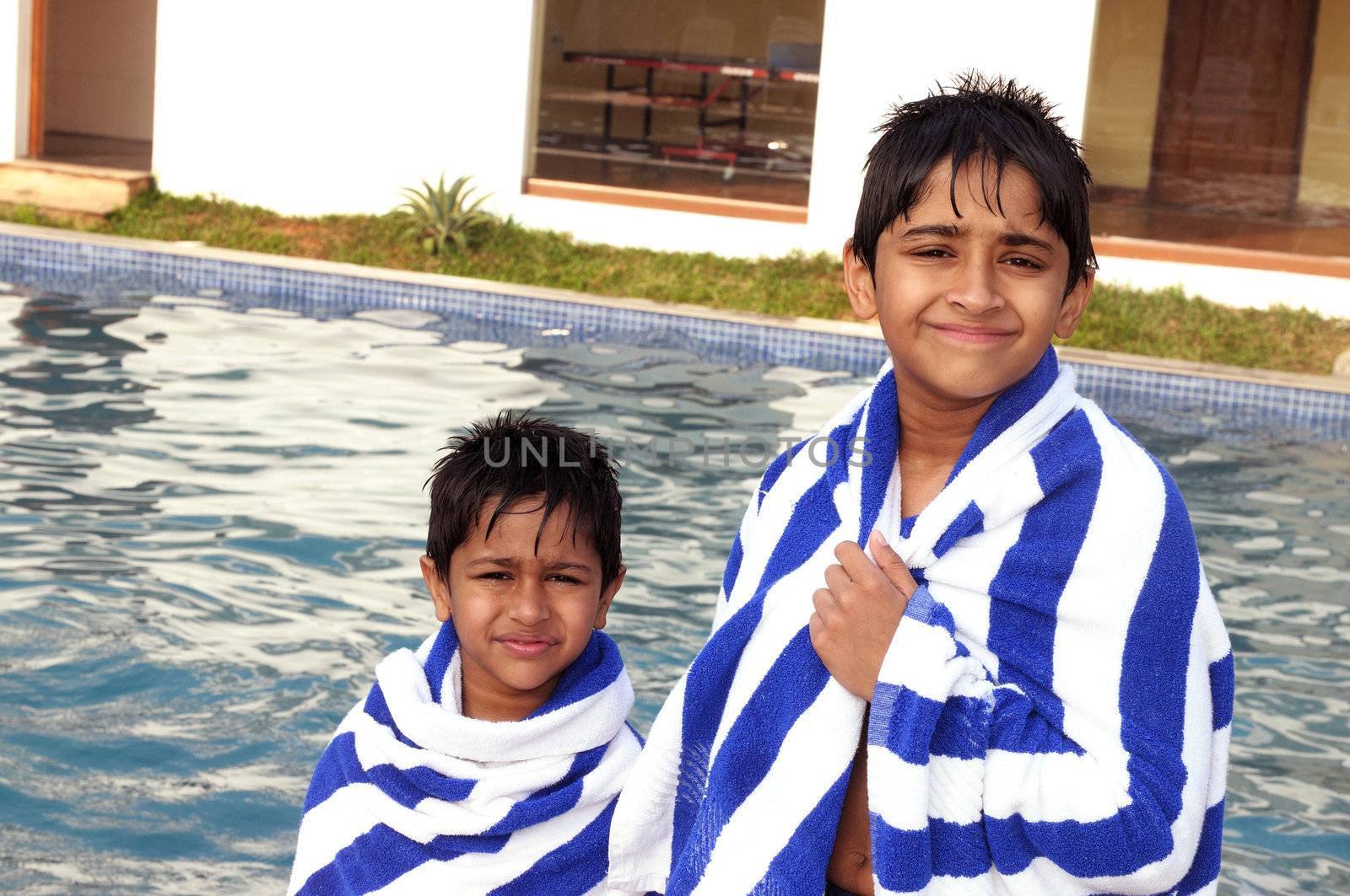 Handsome Indian brothers after a pool session