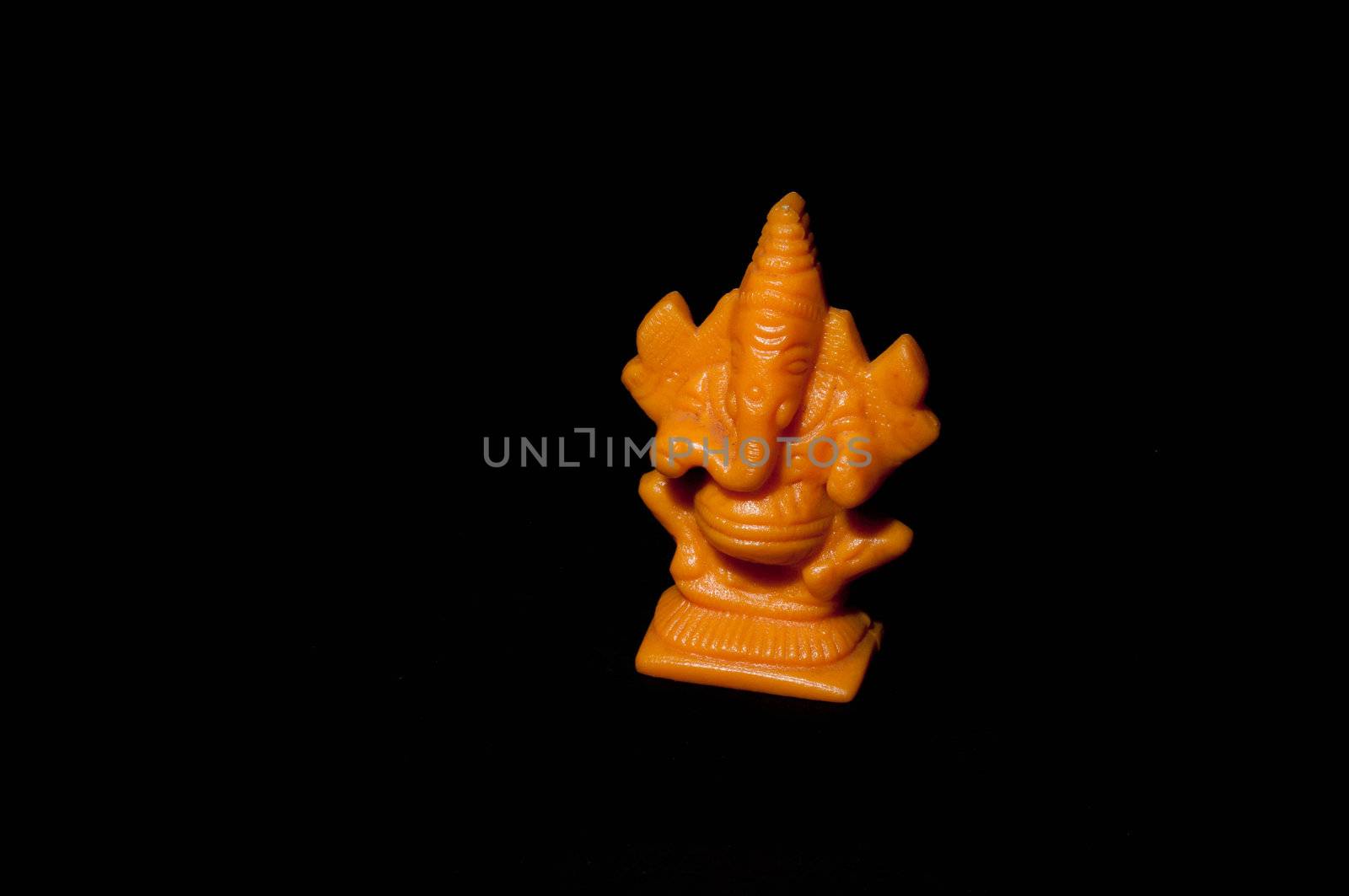 Statue of Indian god isolated on black background