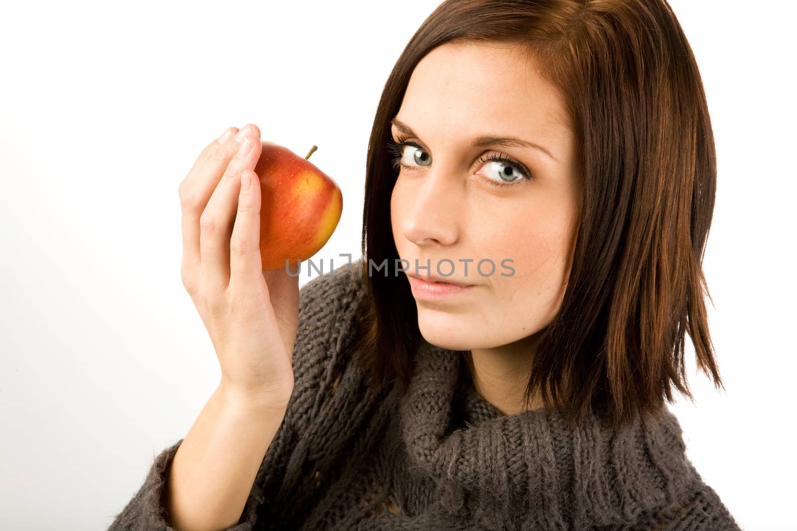 Woman eating Apple by leaf