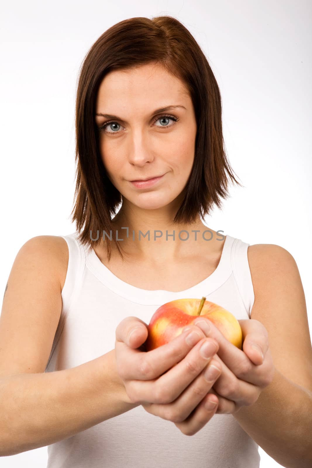 A young woman holding an apple