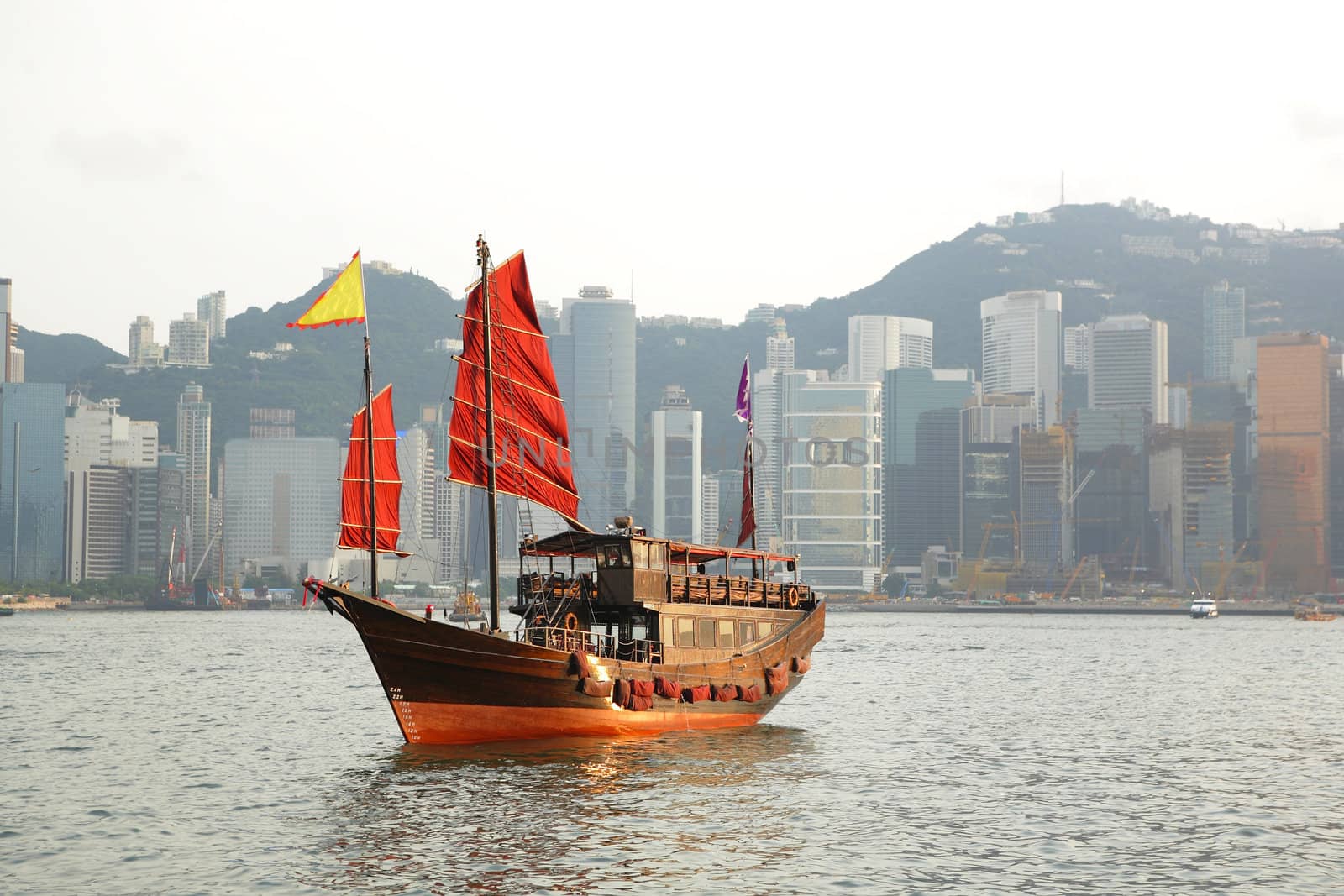 Hong Kong harbour with tourist junk