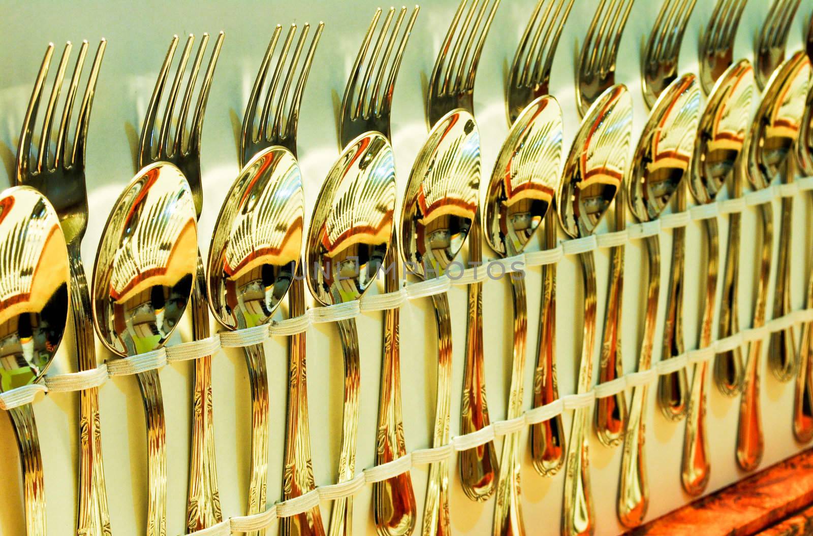 Shinny metal spoons, forks and knifes 