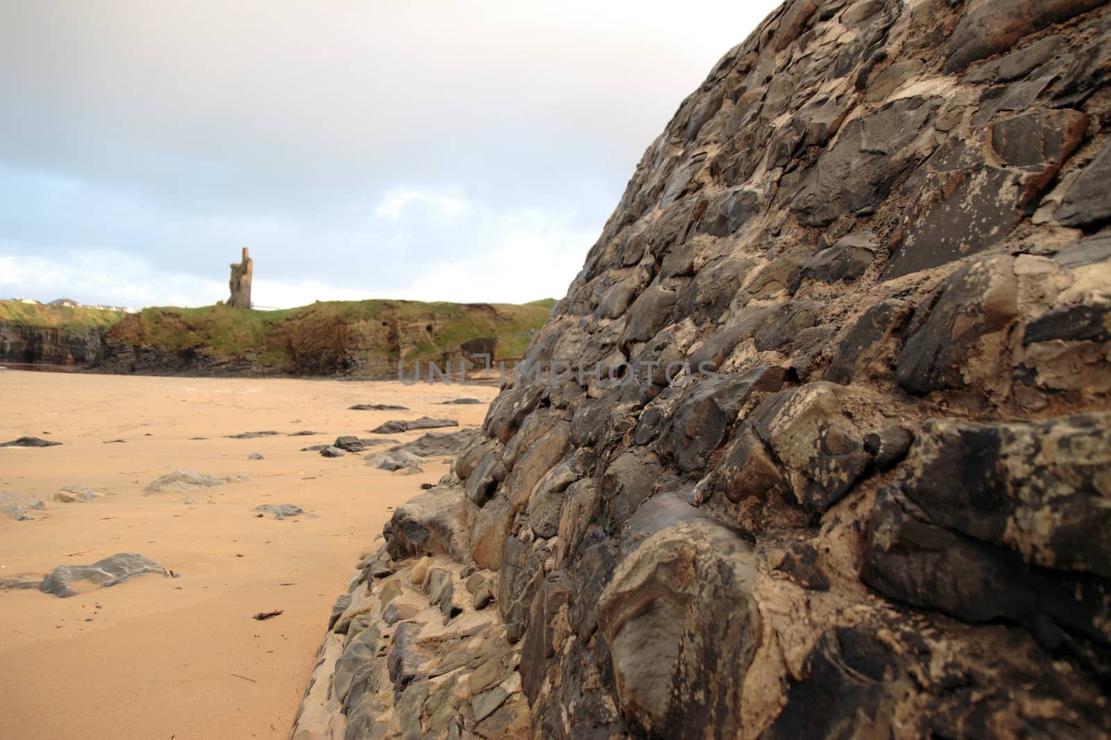 ballybunion beach with the famous castle on the cliffs