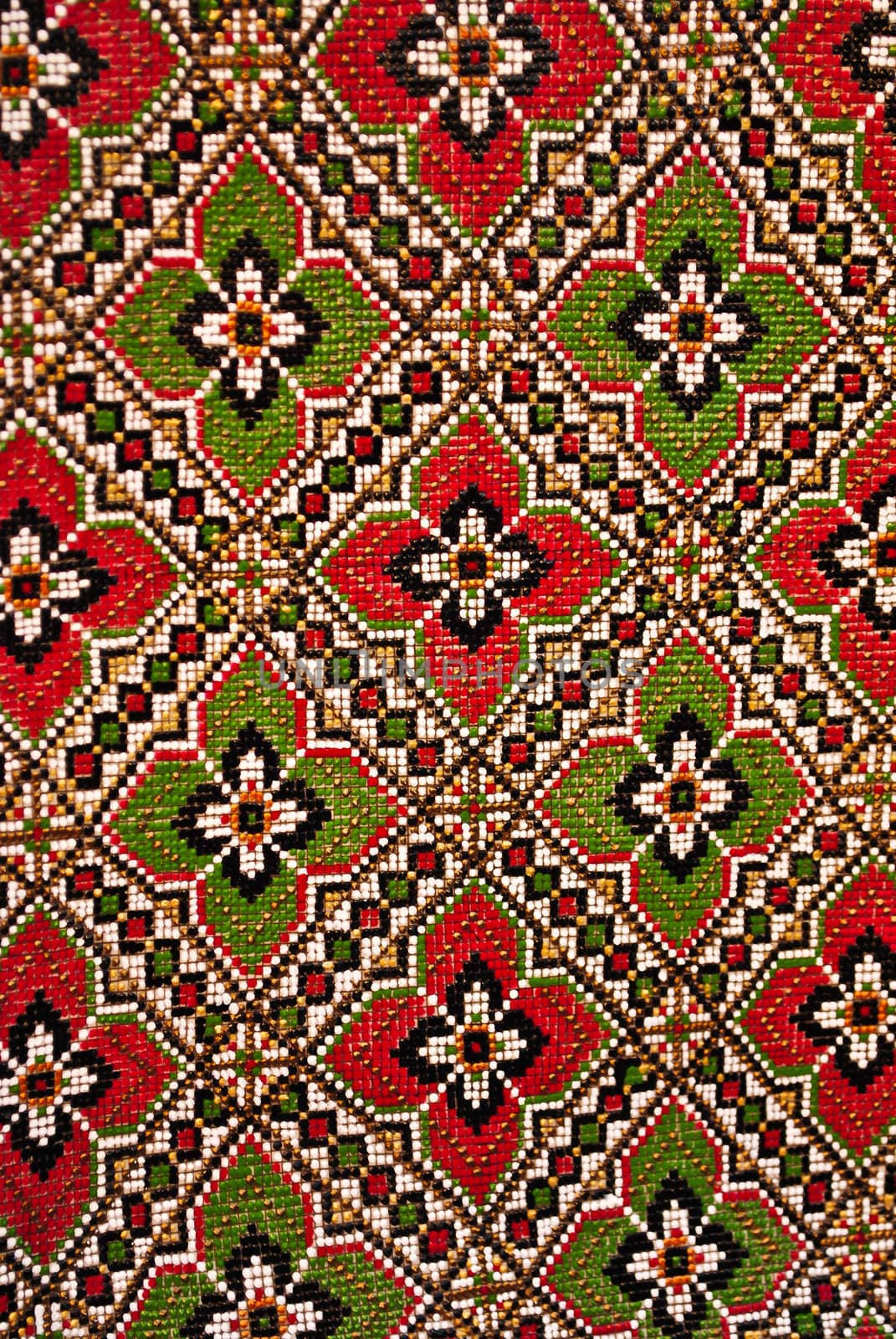 Red and green handmade traditional floral pattern