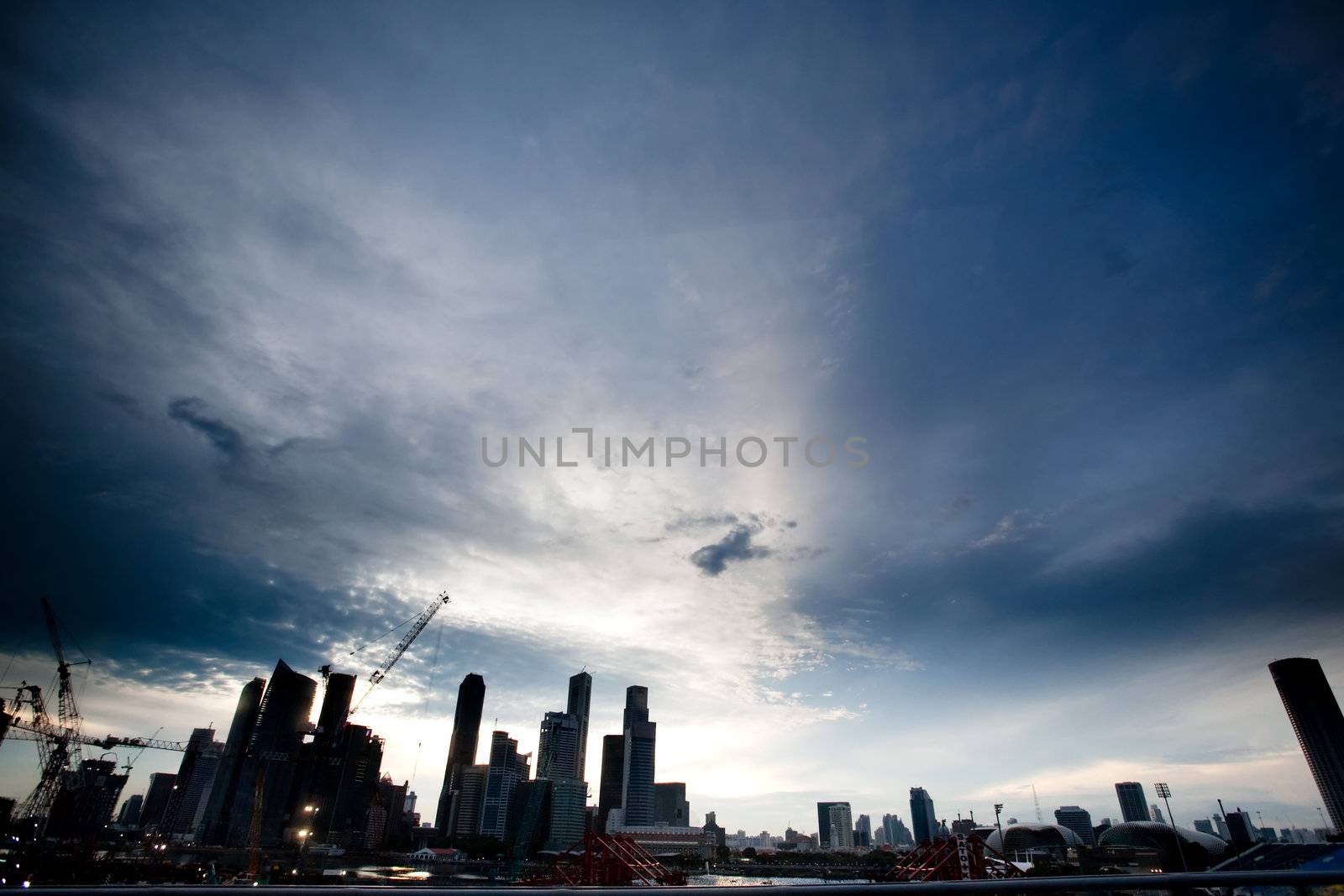 Singpore skyline in dramatic clouds - silhouette