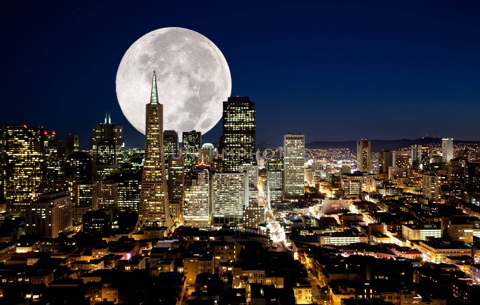 A full moon over a urban metropolis