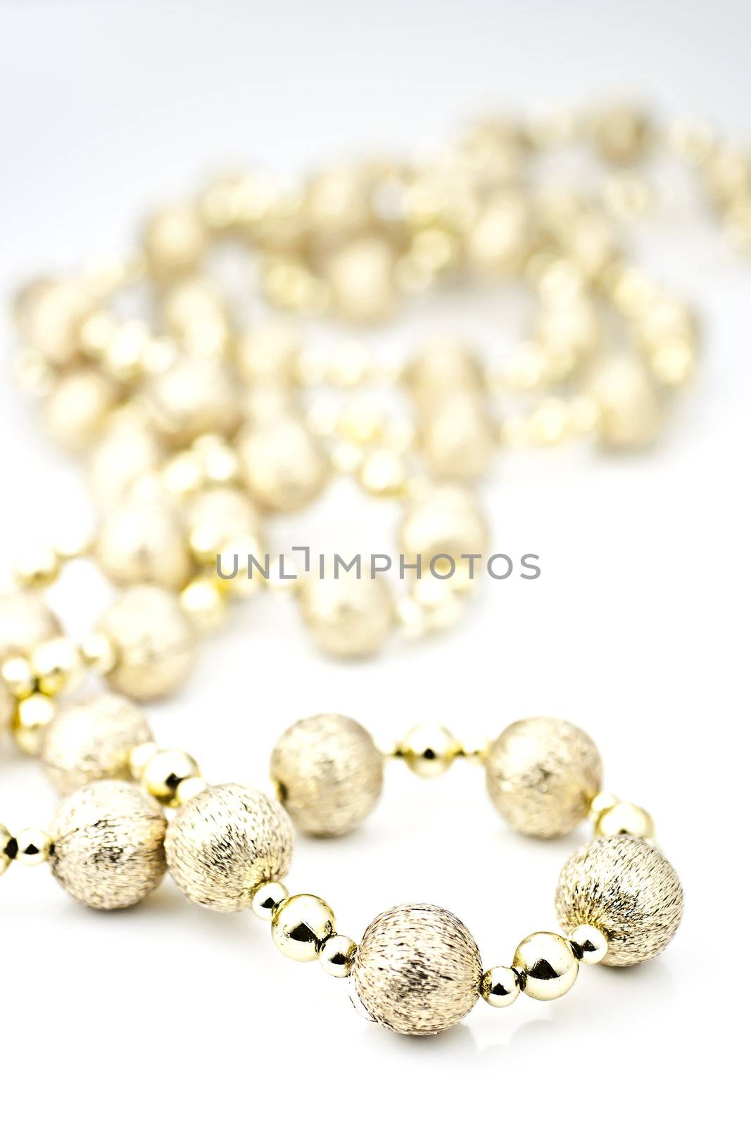 Decorative ball chains on the white background.
