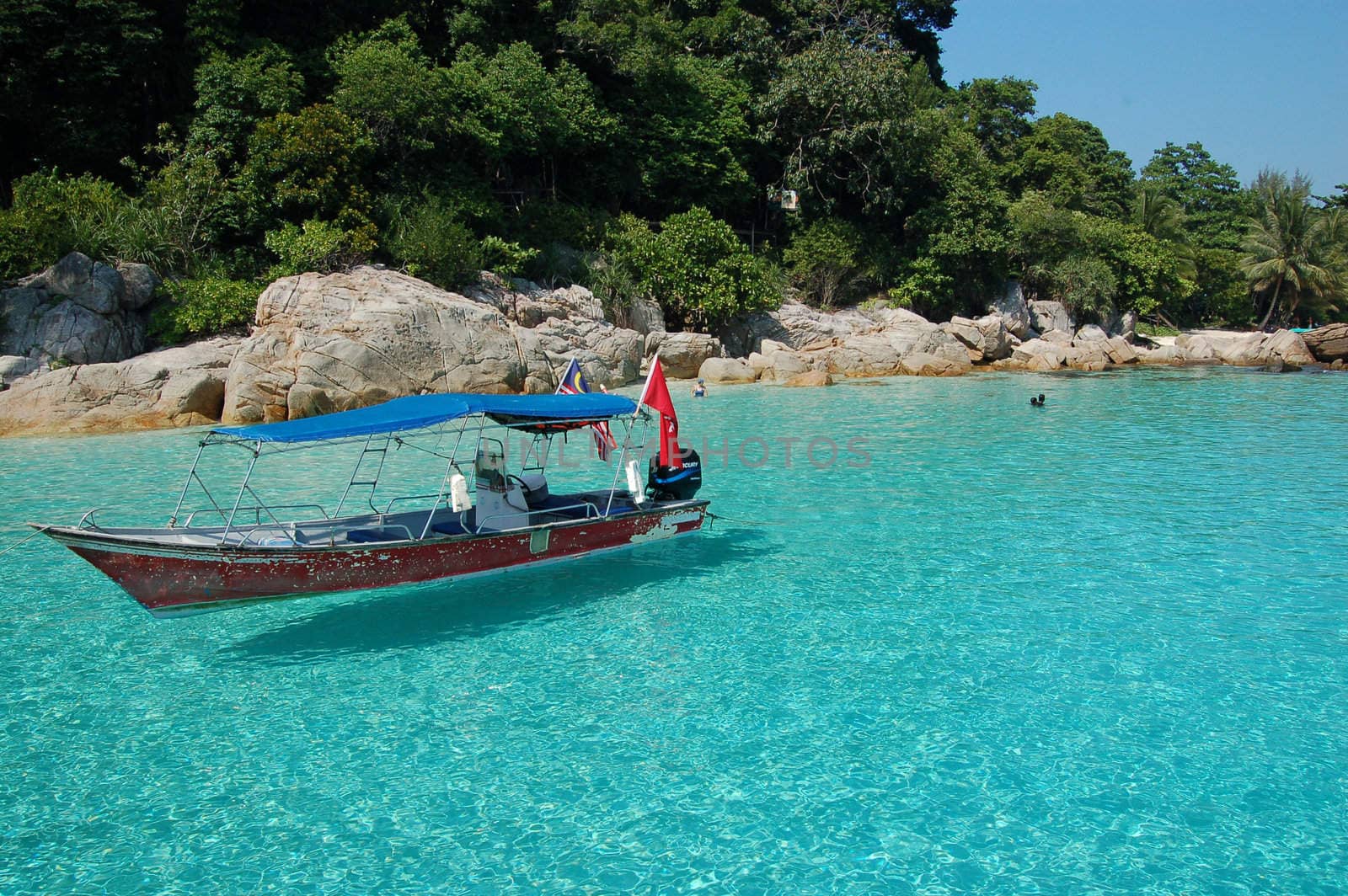 Boat on the blue sea - Perhentian, Malaysia