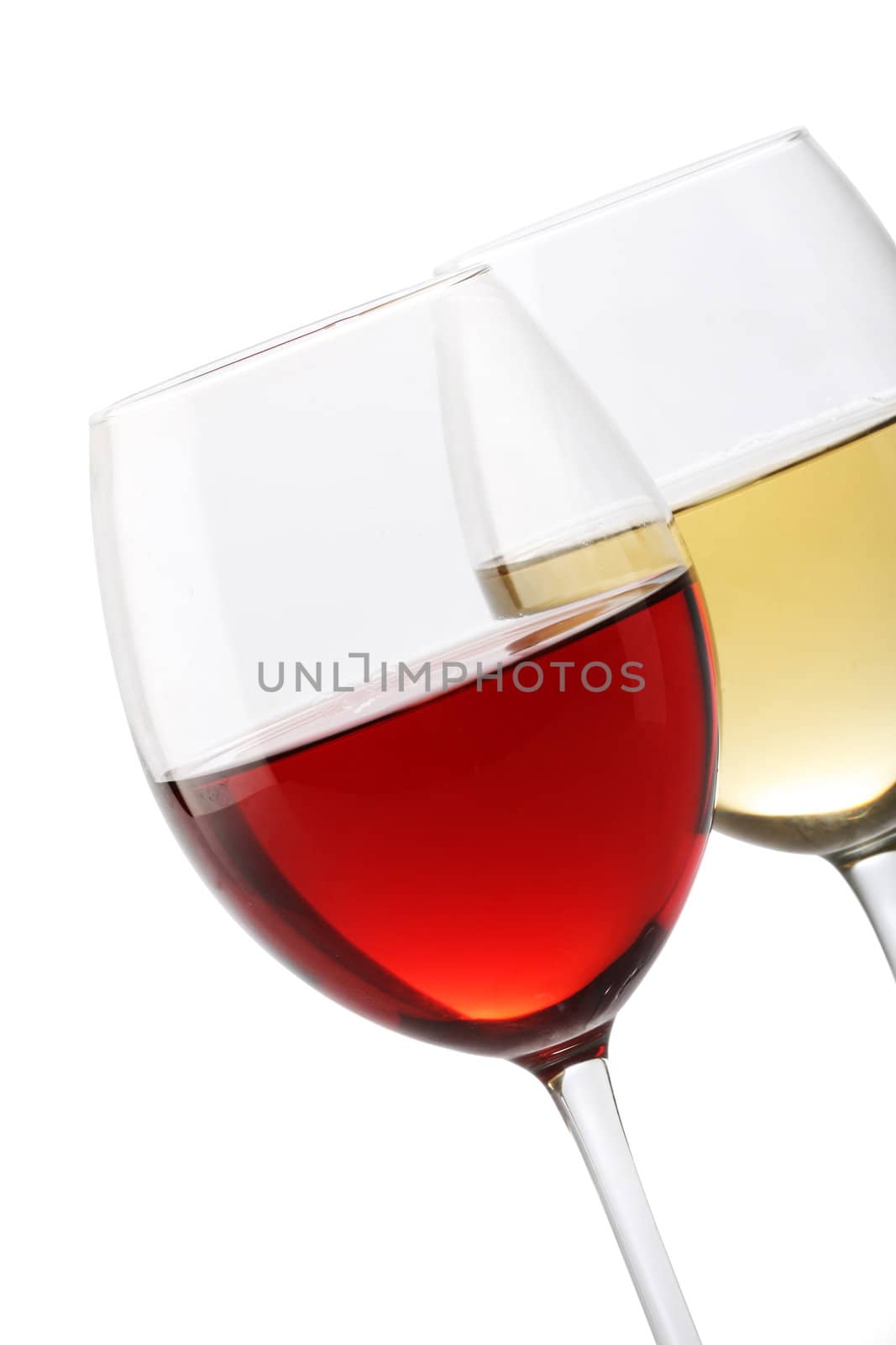 Two glasses of wine, one with red and the other with white