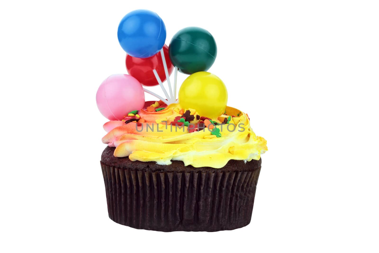 Chocolate birthday cake with plastic balloons. Isolated on a white background.