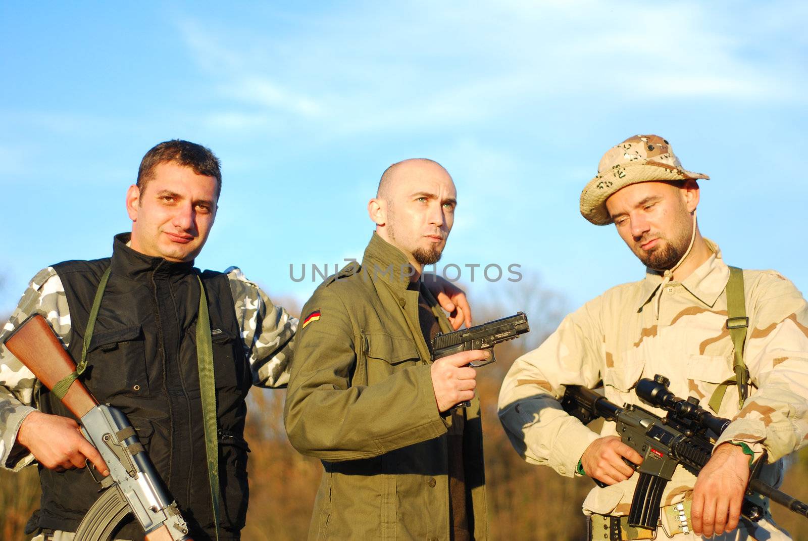 three kind of soldiers posing military movie poster like