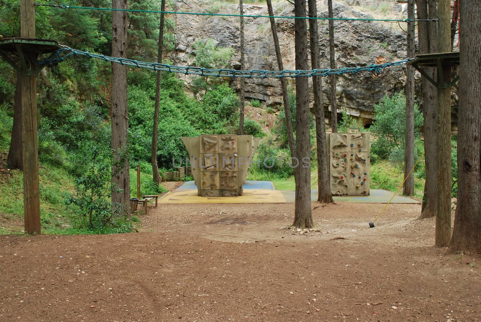 View of climbings walls and other activities on a park by luissantos84