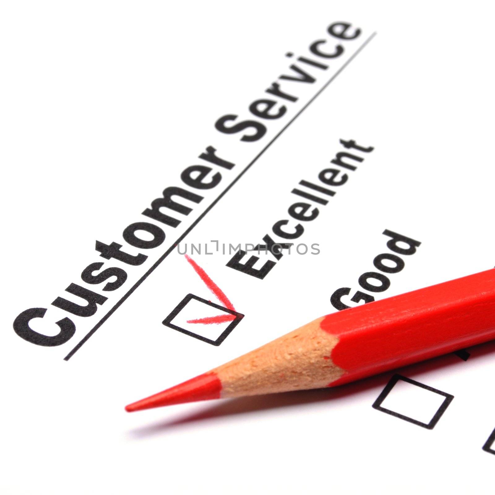 checkbox and red pen showing customer service survey or satisfaction concept to improve sales