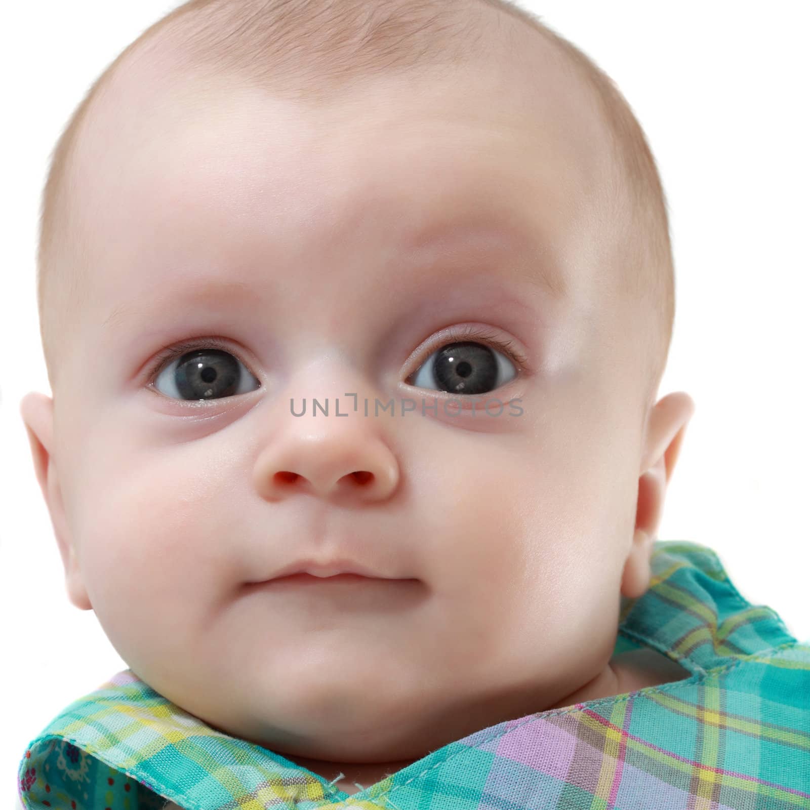 closeup portrait of a cute caucasian baby girl