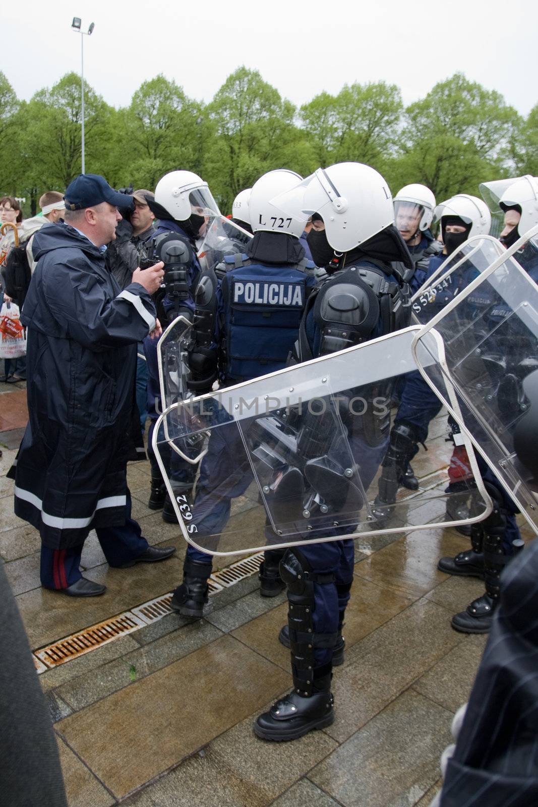 RIGA, LATVIA, MAY 9, 2009: Riot police ready to exclude provocation at Celebration of May 9 Victory Day (Eastern Europe) in Riga at Victory Memorial to Soviet Army