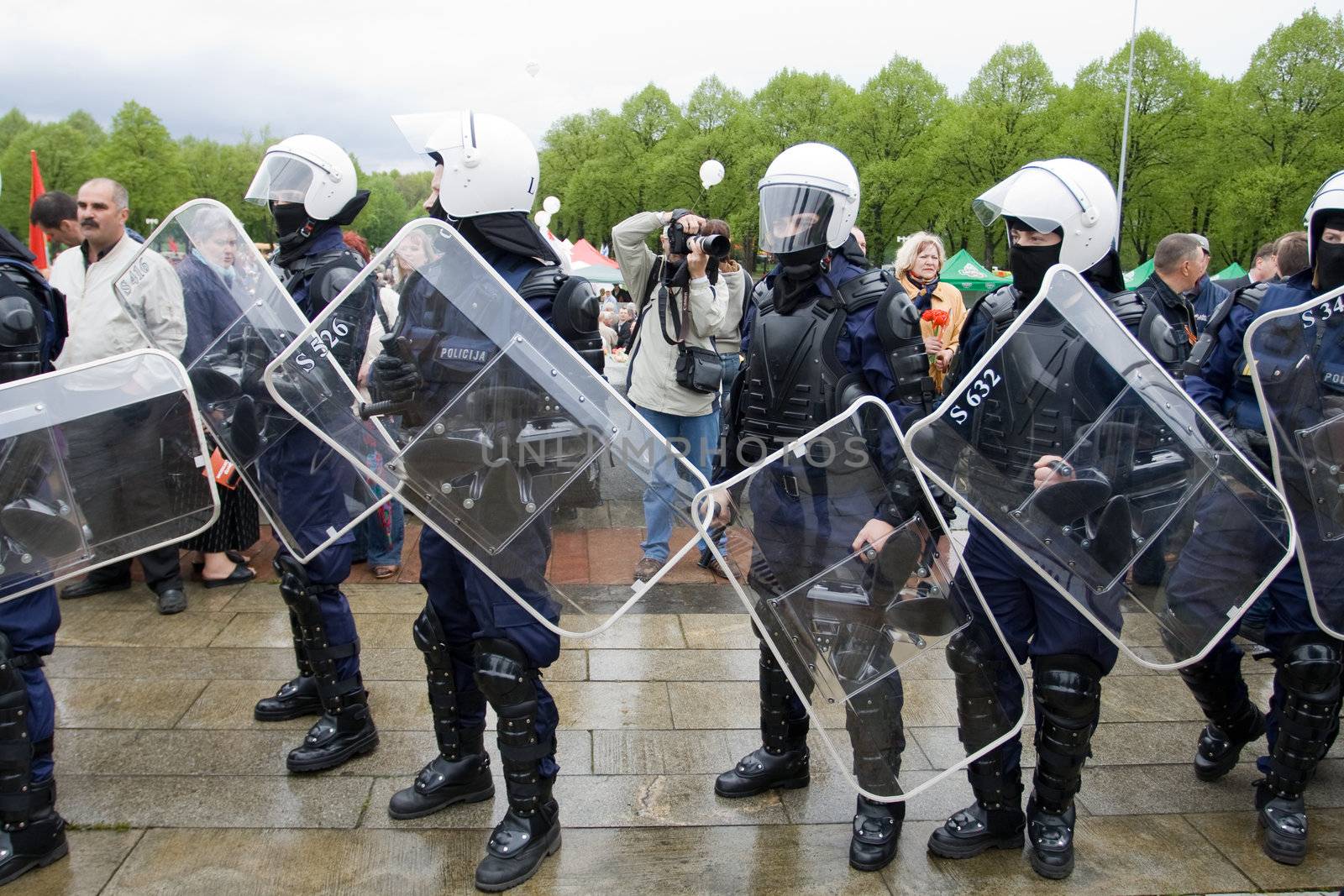 RIGA, LATVIA, MAY 9, 2009: Riot police ready to exclude provocation at Celebration of May 9 Victory Day (Eastern Europe) in Riga at Victory Memorial to Soviet Army
