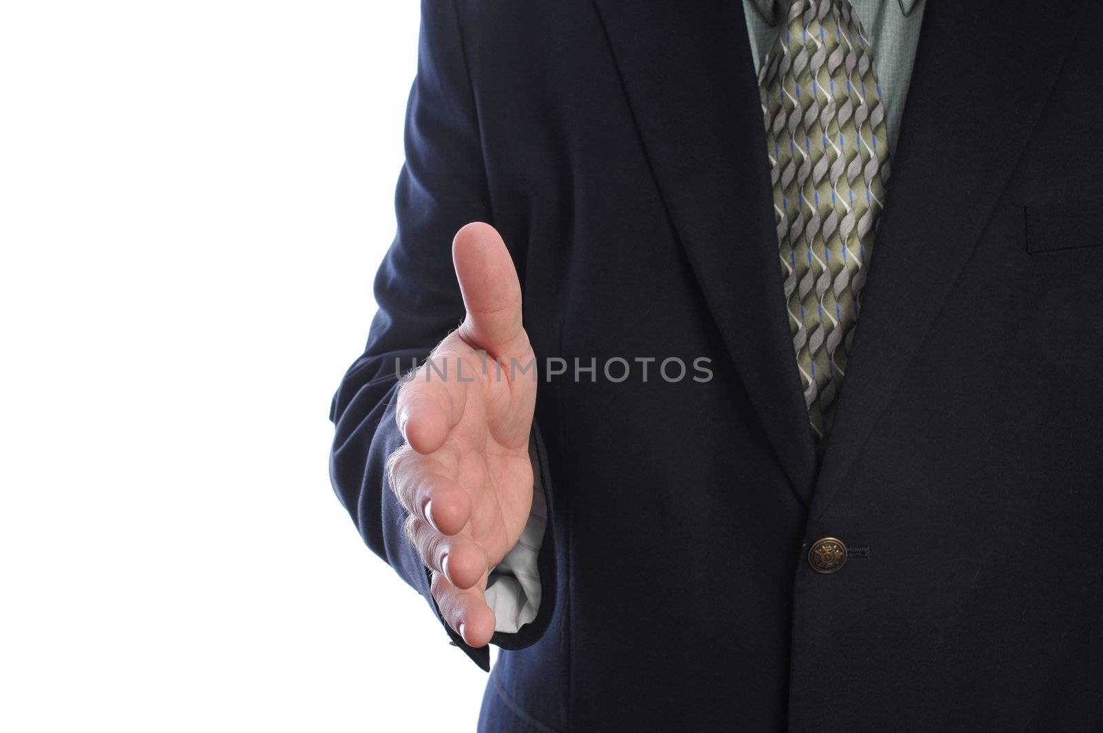 business man ready to shake by PDImages