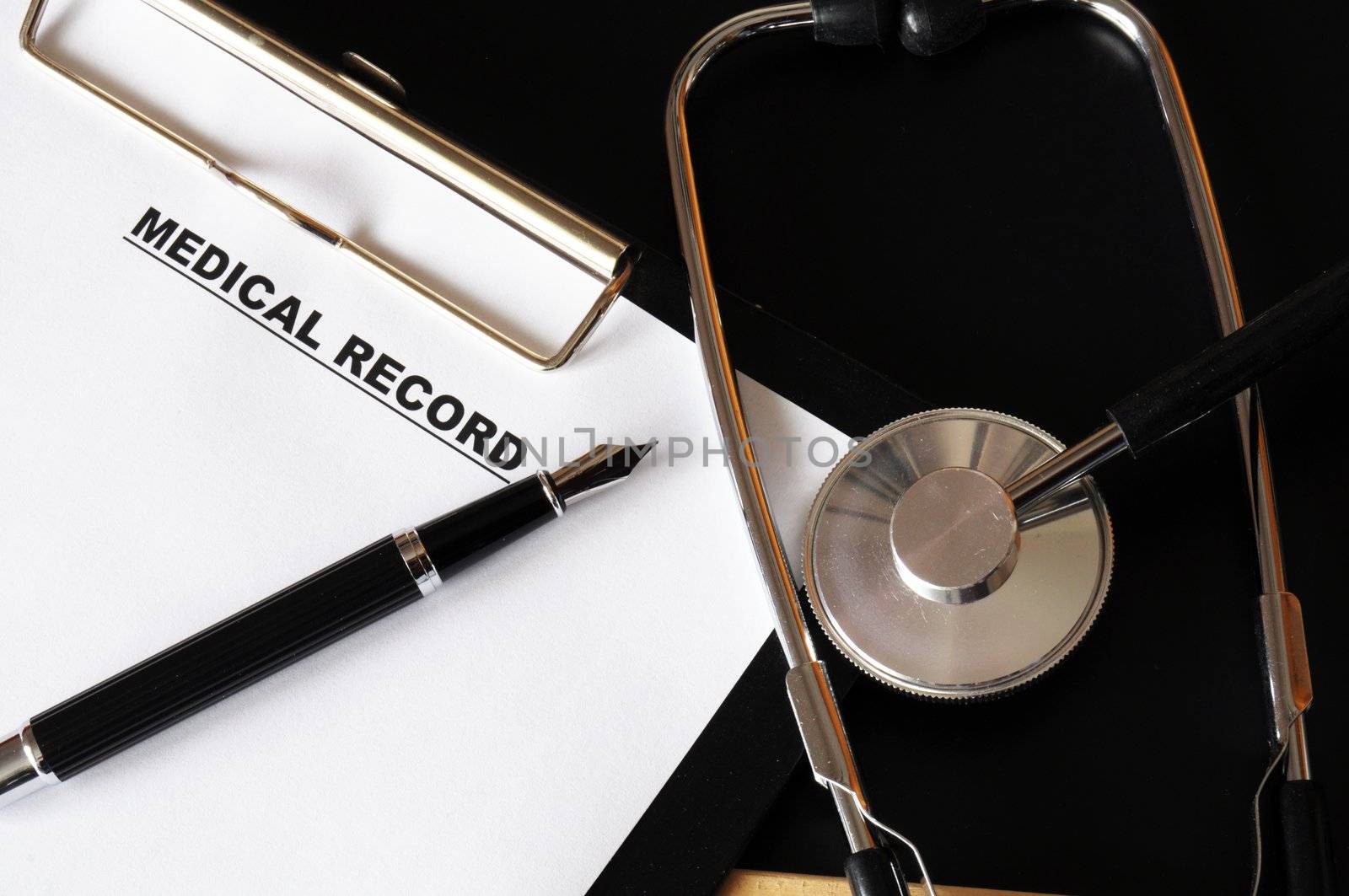 medical record clipboard and stethoscope showing health or medicine concept