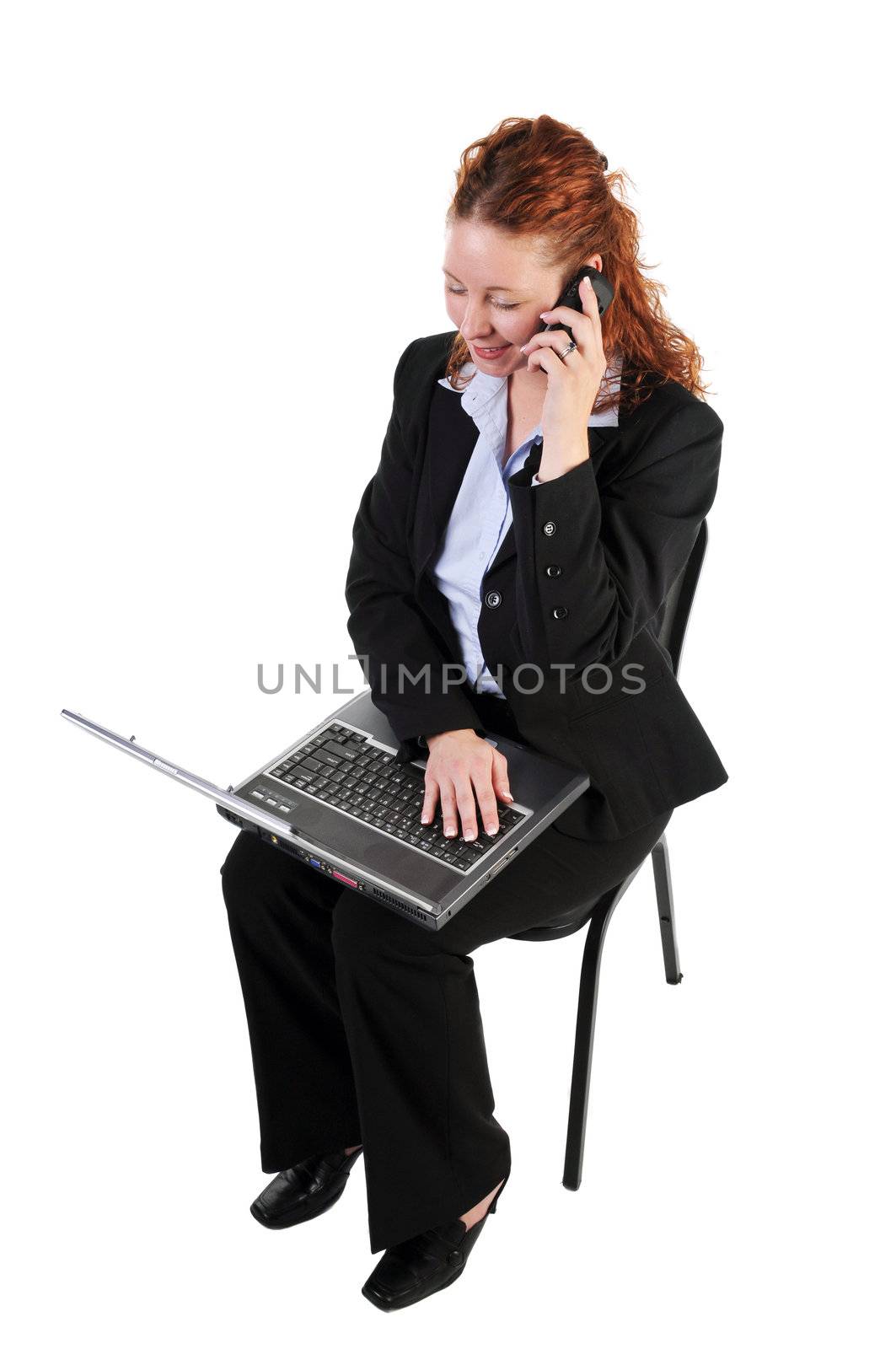 business woman with laptop by PDImages