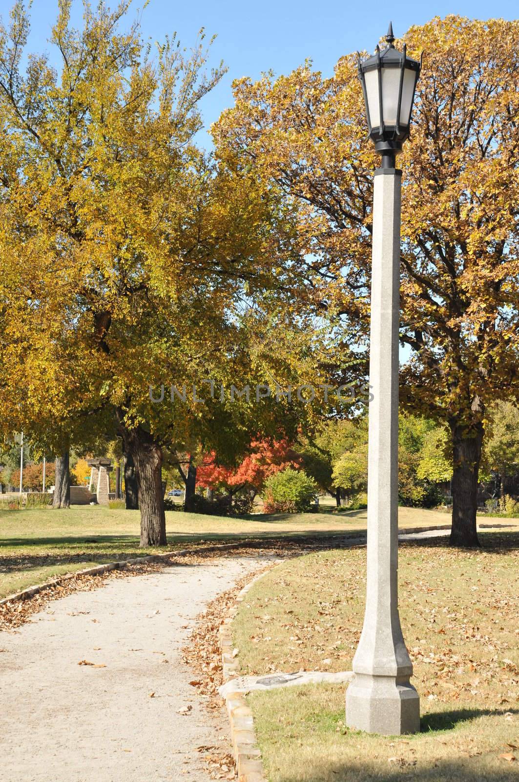 lamp post on trail by PDImages