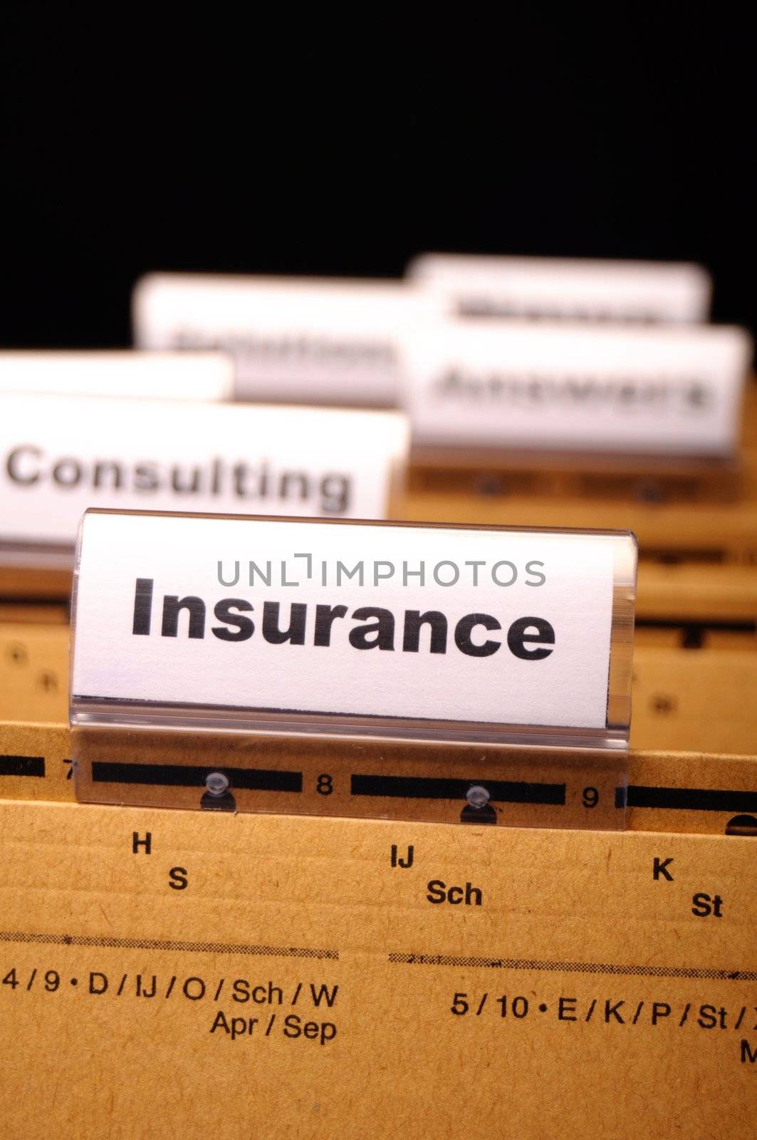 insurance word on business folder showing risk management concept