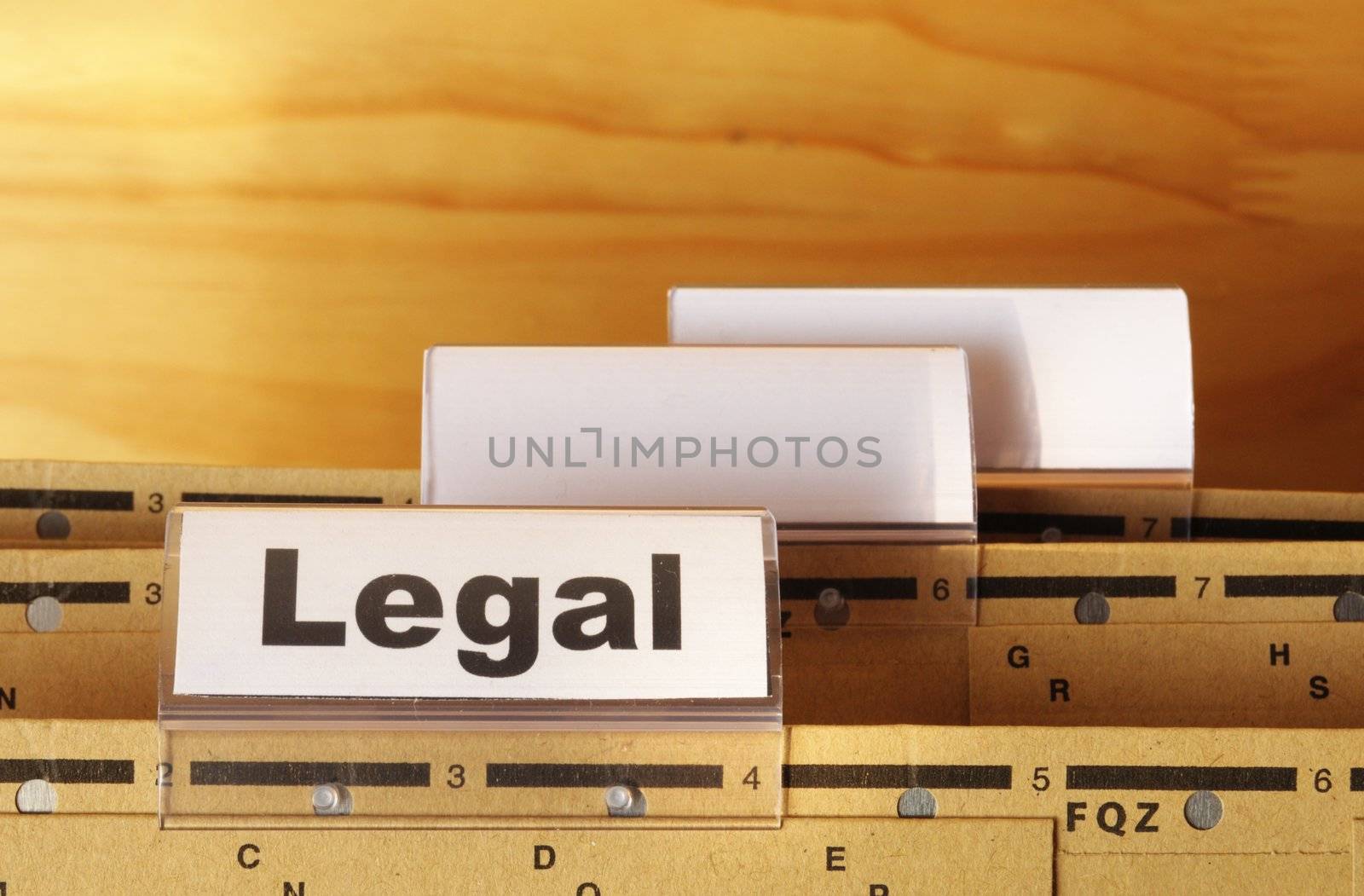 legal word on folder index showing law court or justice concept
