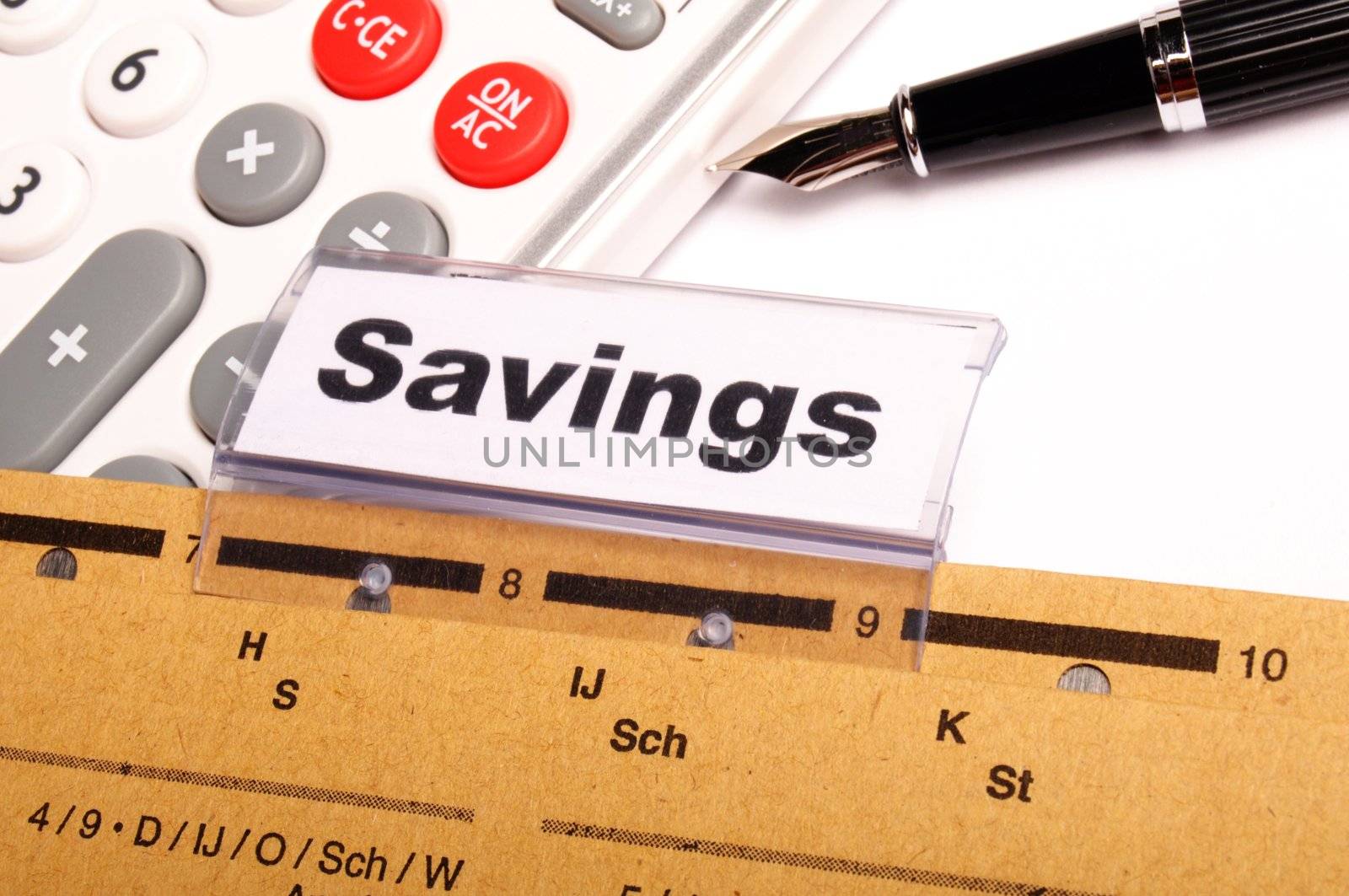 savings word on business folder showing saving money concept