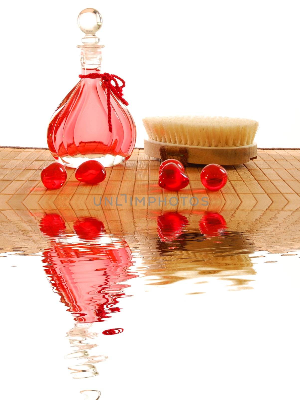 spa still life and water reflection showing wellness concept