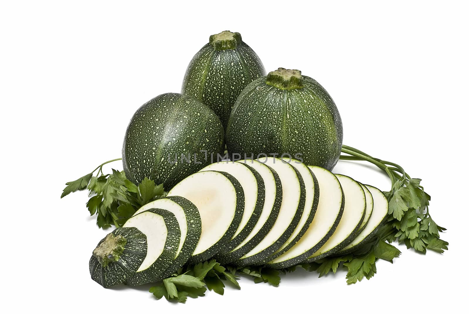 Round zucchini isolated on a white background.