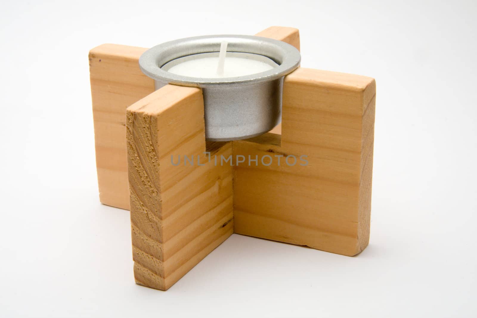 Closeup of a candle on a white background not burning