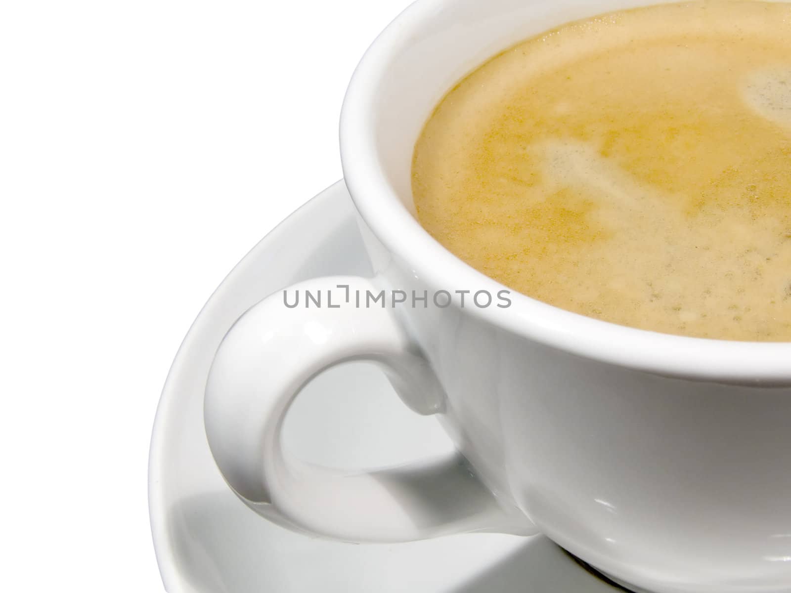 A cup of coffee with foam on a white background