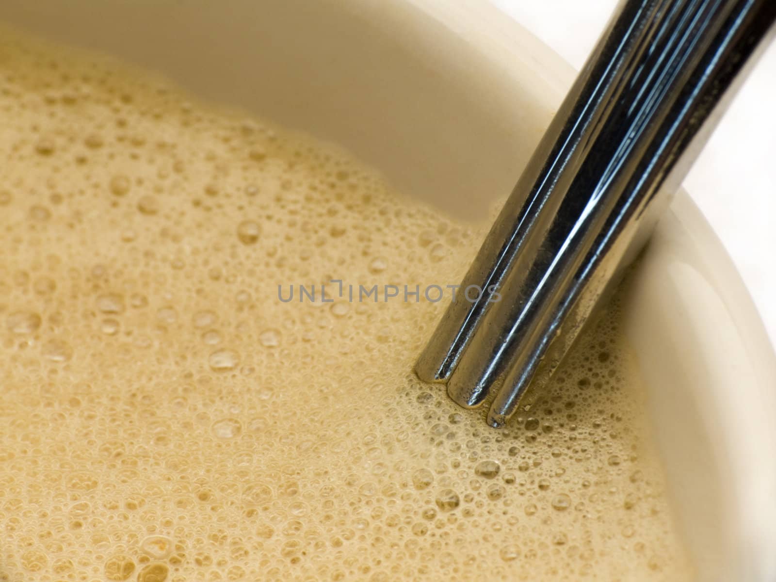 Macroshot of coffee and spoon