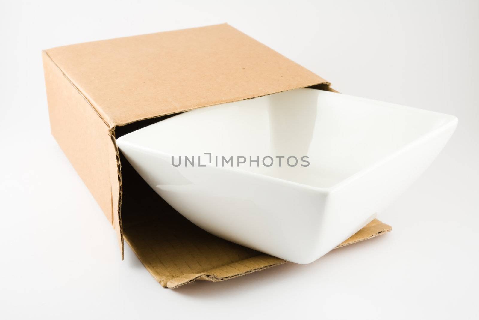 Dish in Cardboard Box isolated on a white background