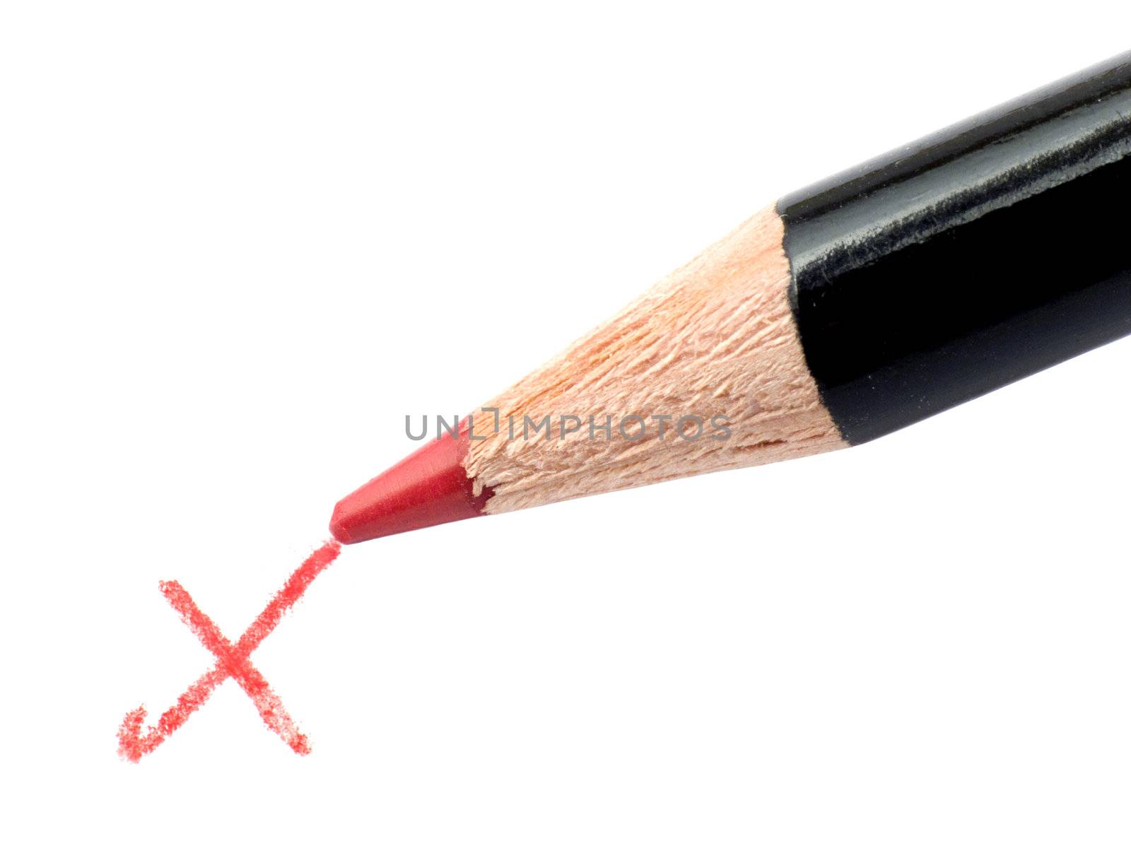 Closeup of a Pencil and checkmark isolated on a white background