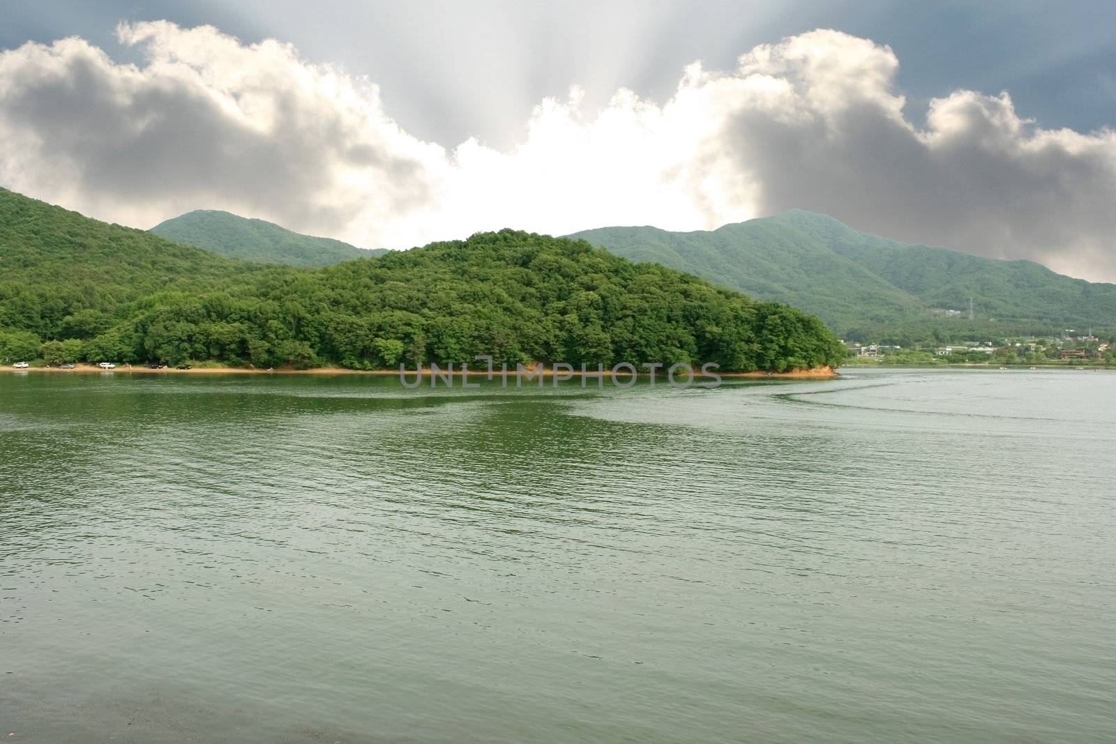 Lake Gwacheon in Anyang Korea - lake mountain and sunbeam