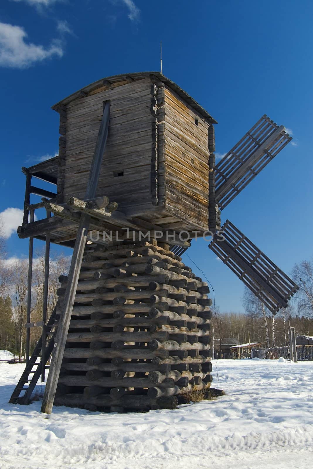 Wooden wind mill on north of the Europe by Fanfo