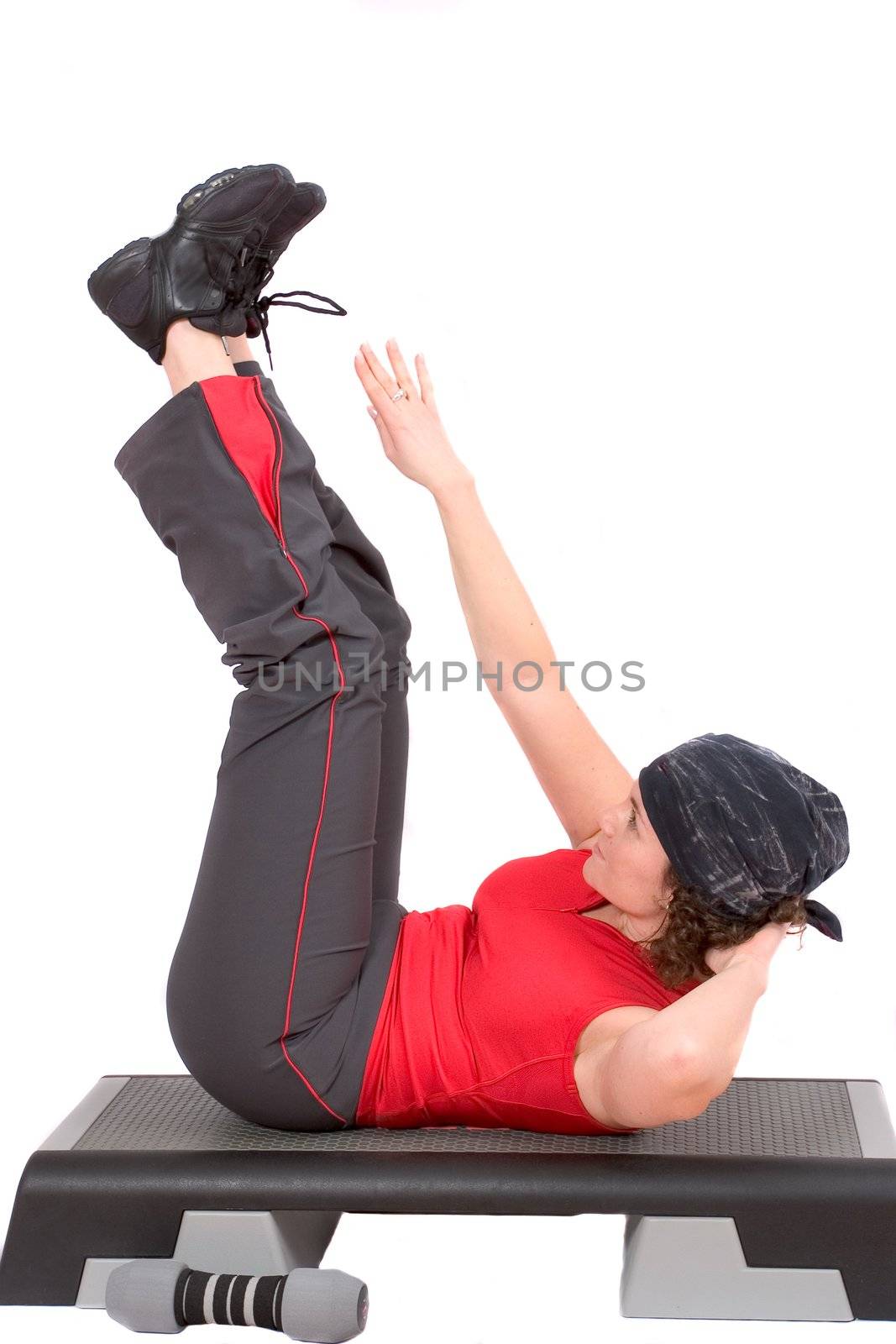 Pretty woman doing abdominal exercises
