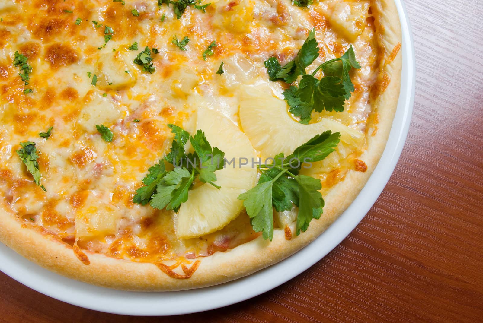 Tasty Italian pizza with pineapple  , isolated on white background.