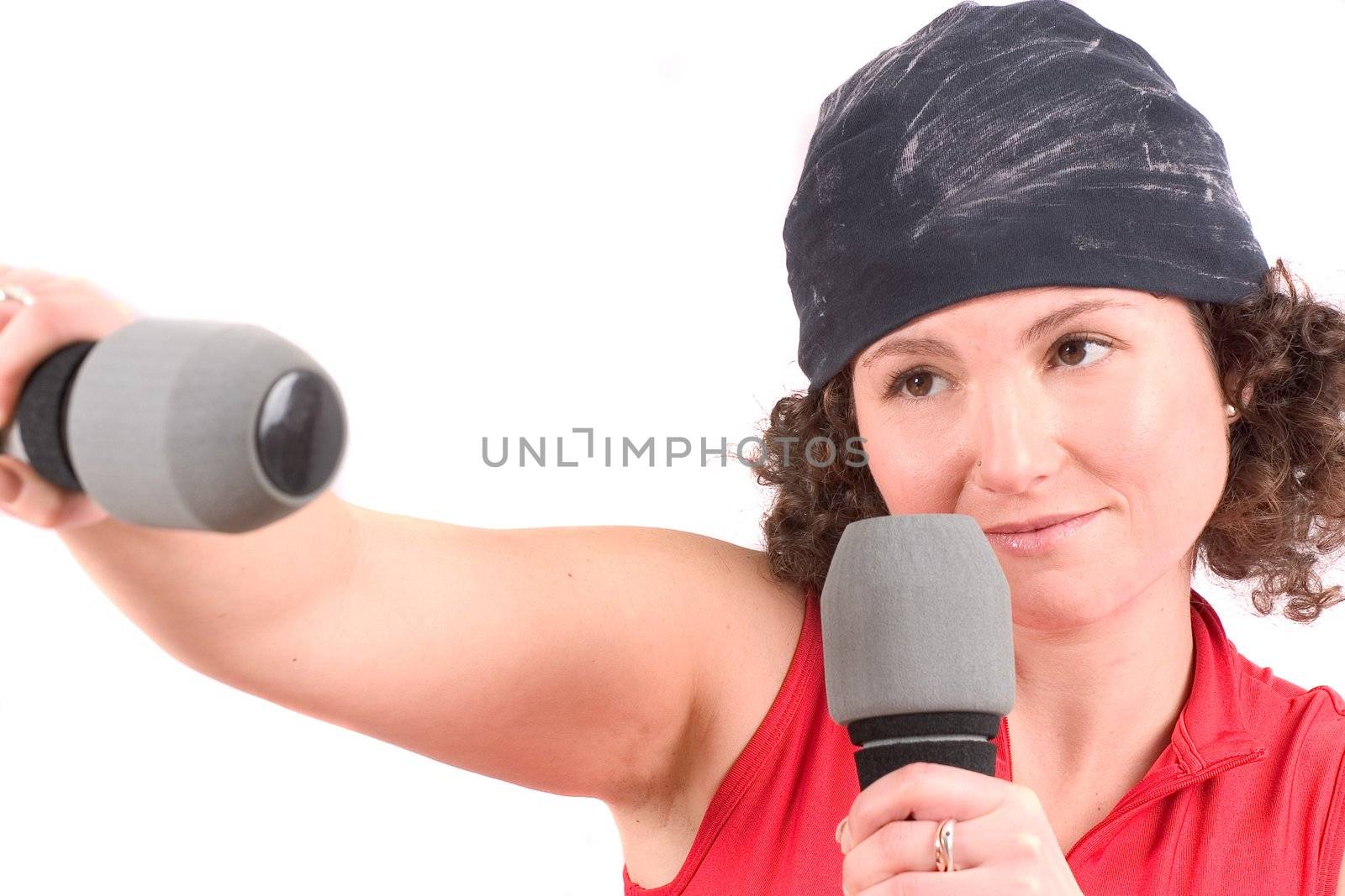 Attractive young woman punching with handweights
