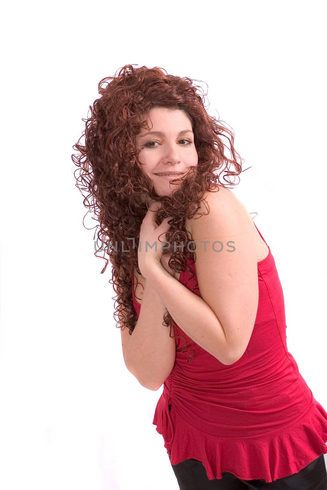 Beautiful woman pulling her hair around herself