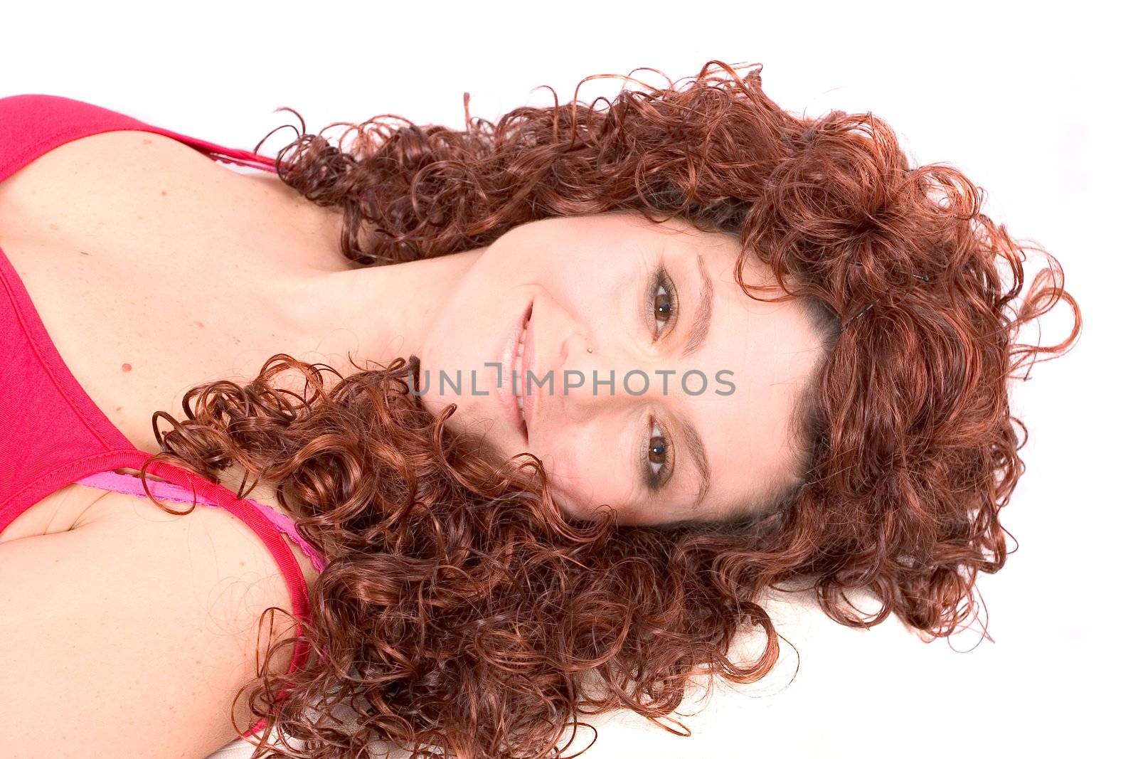 Beautiful woman lying relaxed and smiling