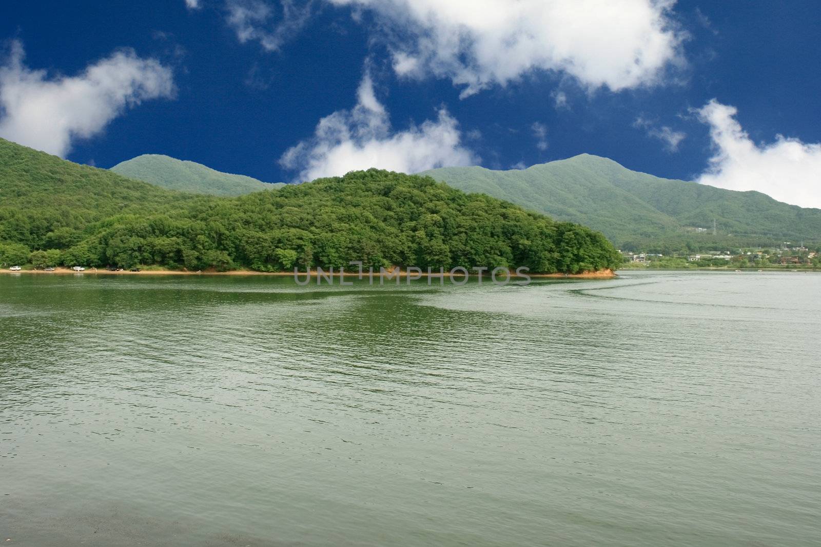 Lake Gwacheon in Anyang Korea - lake mountain and sunbeam