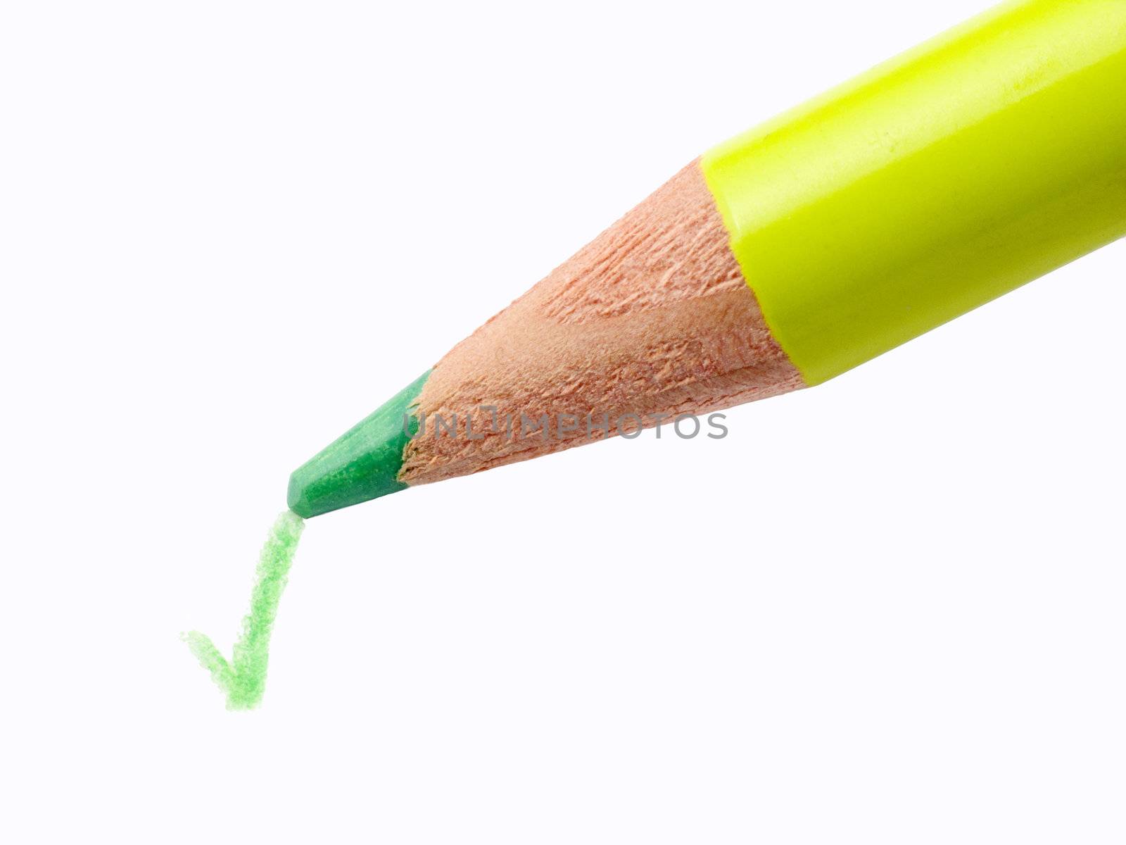 Closeup of a Pencil and checkmark isolated on a white background