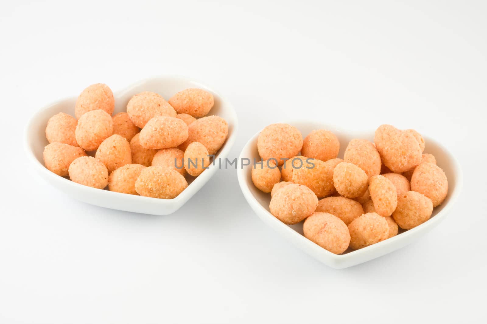 Nuts in hearts isolated on a white background