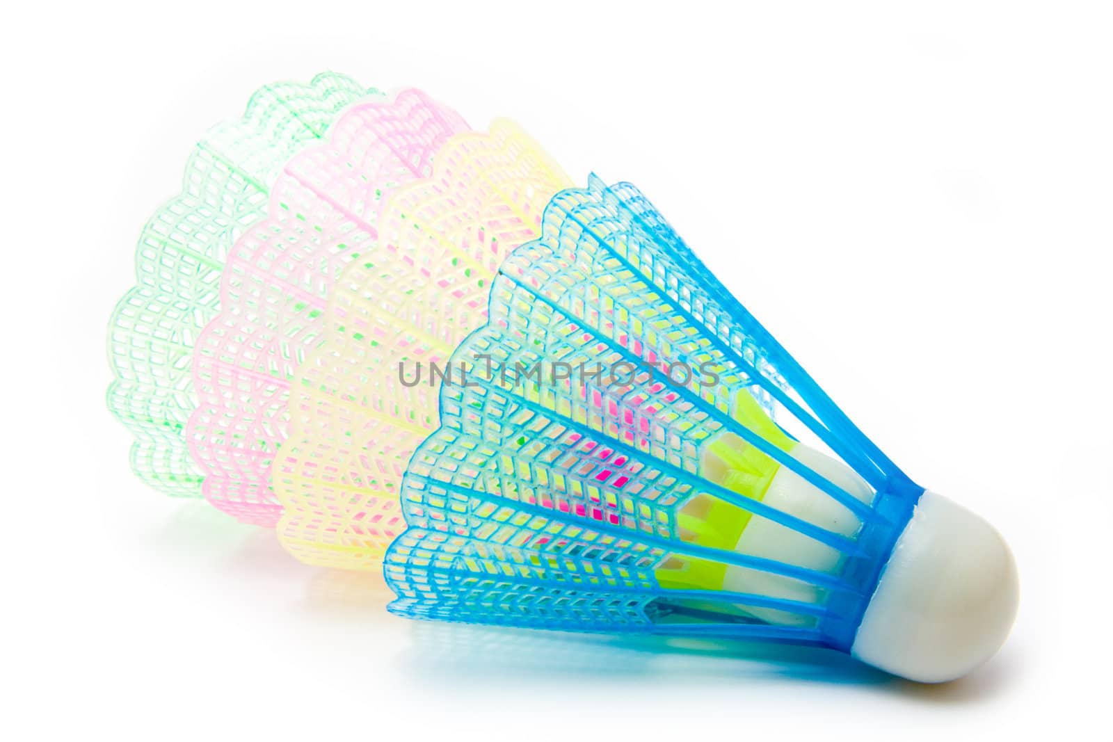 Closeup of stacked badminton shuttles isolated on a white background